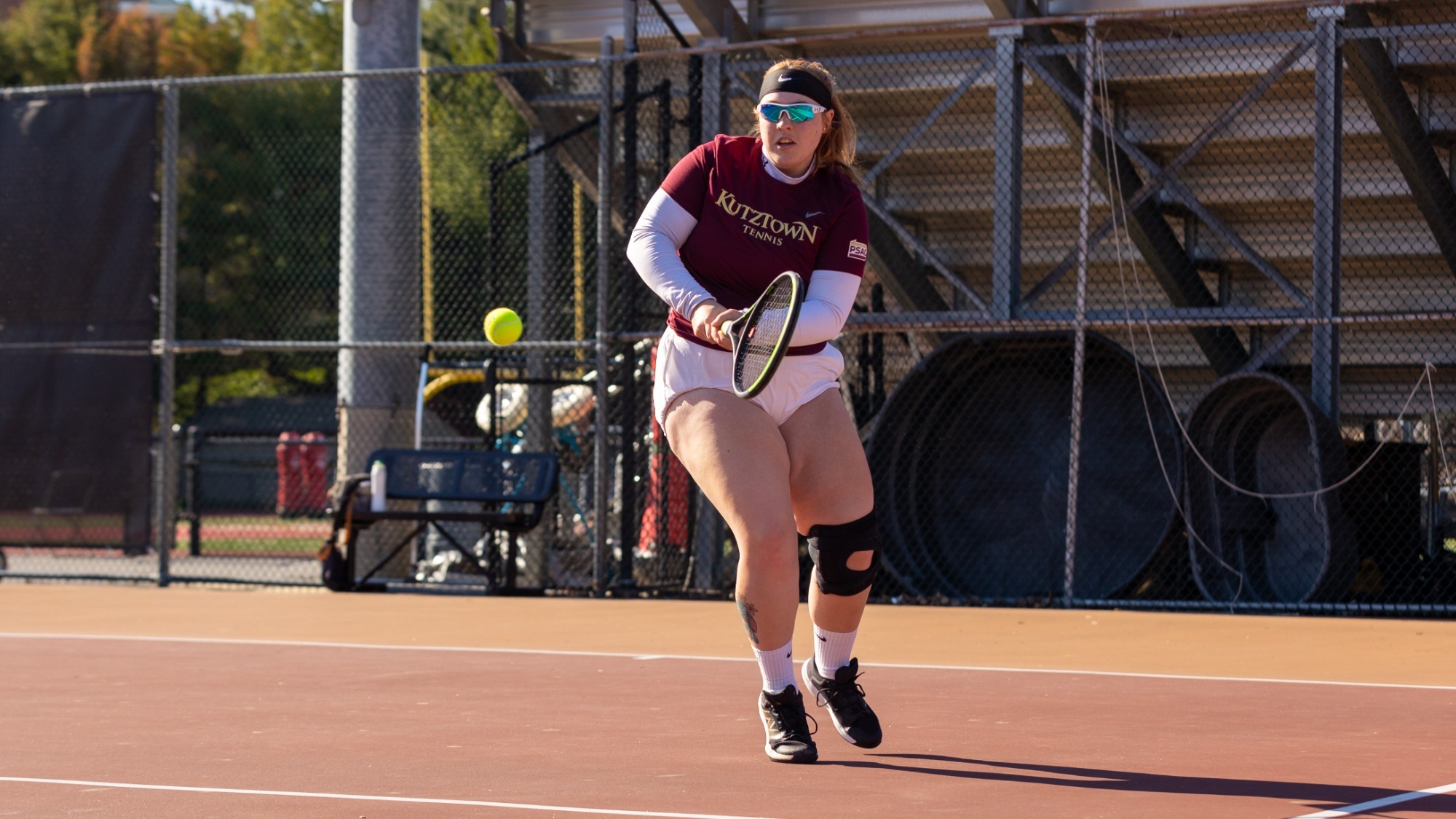 Ryleigh Bohning of the Kutztown University women's tennis team prepares to hit a backhand shot during a PSAC East match against East Stroudsburg on April 7, 2026.