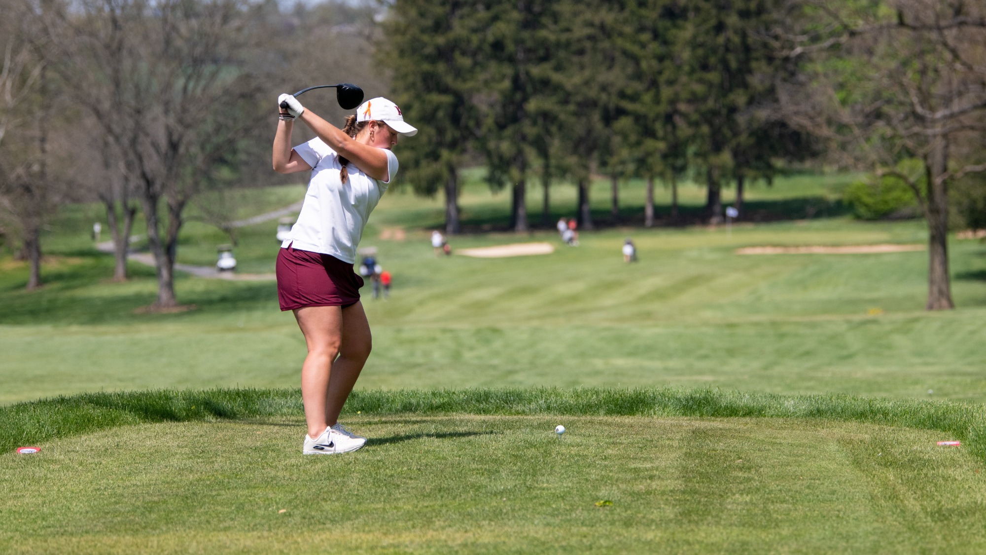 Eva Moawad of the Kutztown University women's golf team prepares to hit a tee shot during the second round of the PSAC Championship at Berkleigh Golf Club on Thursday, April 23, 2026.