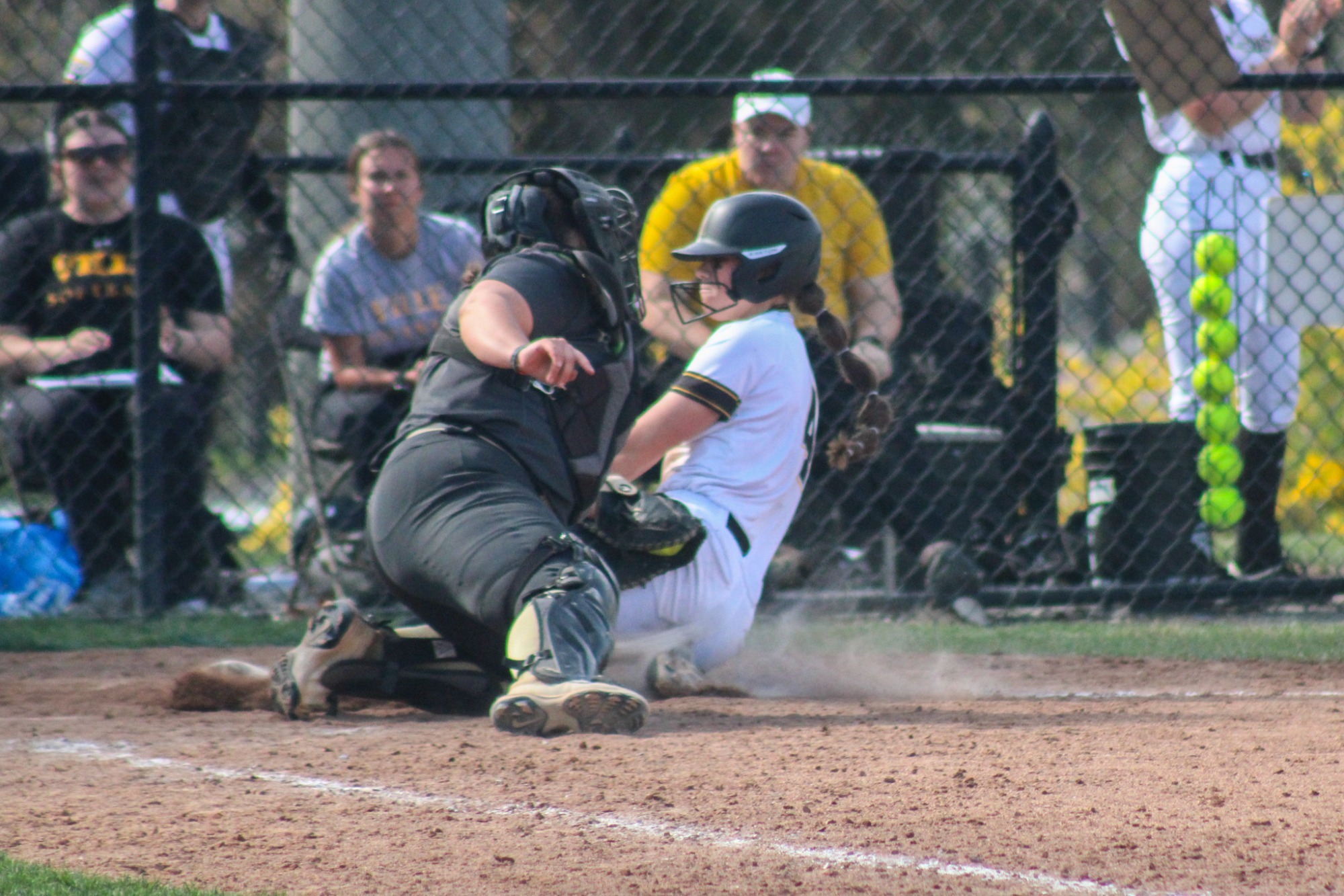 Samantha Paetow making a tag at home plate at Millersville, 4/3/26