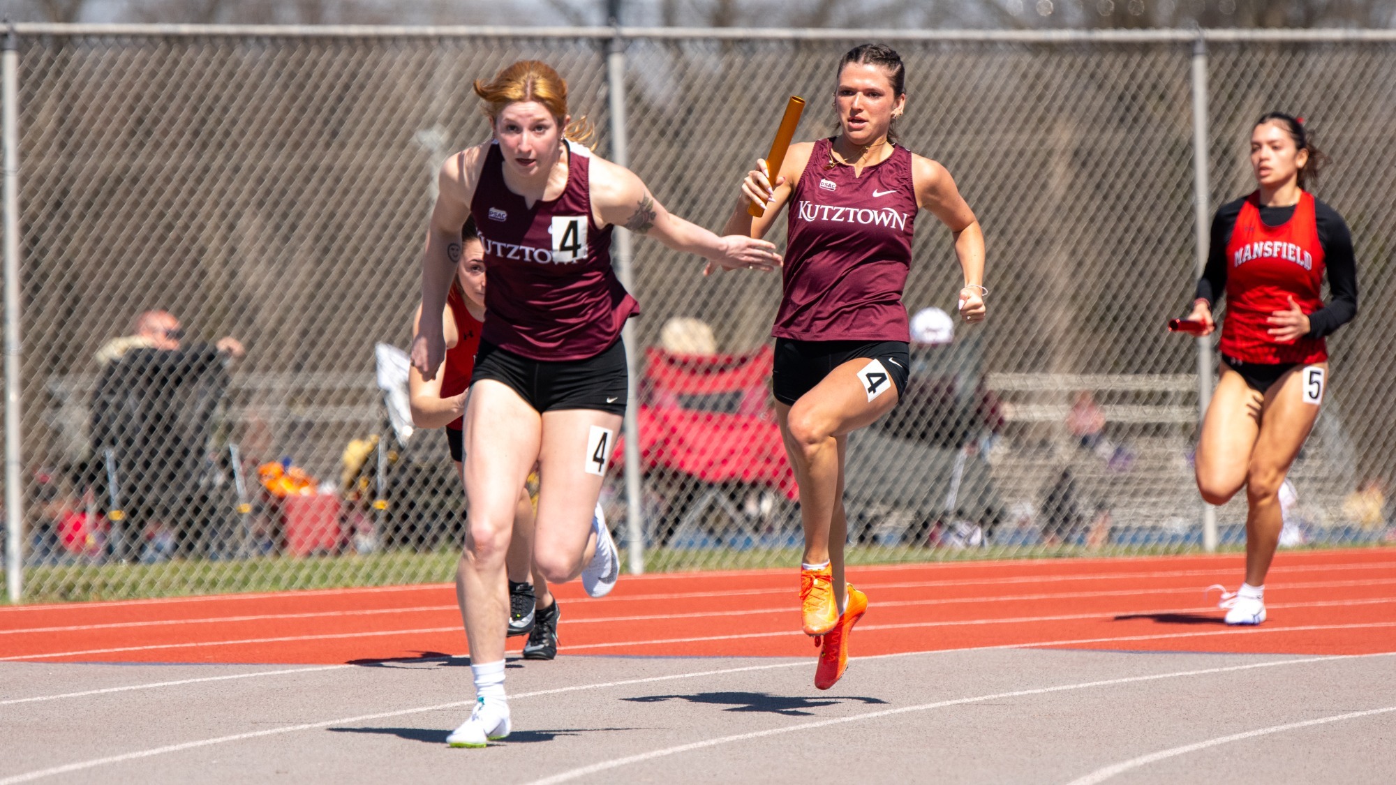 Kutztown relay team passing the batton at the Keystone Challenge, 3/21/26