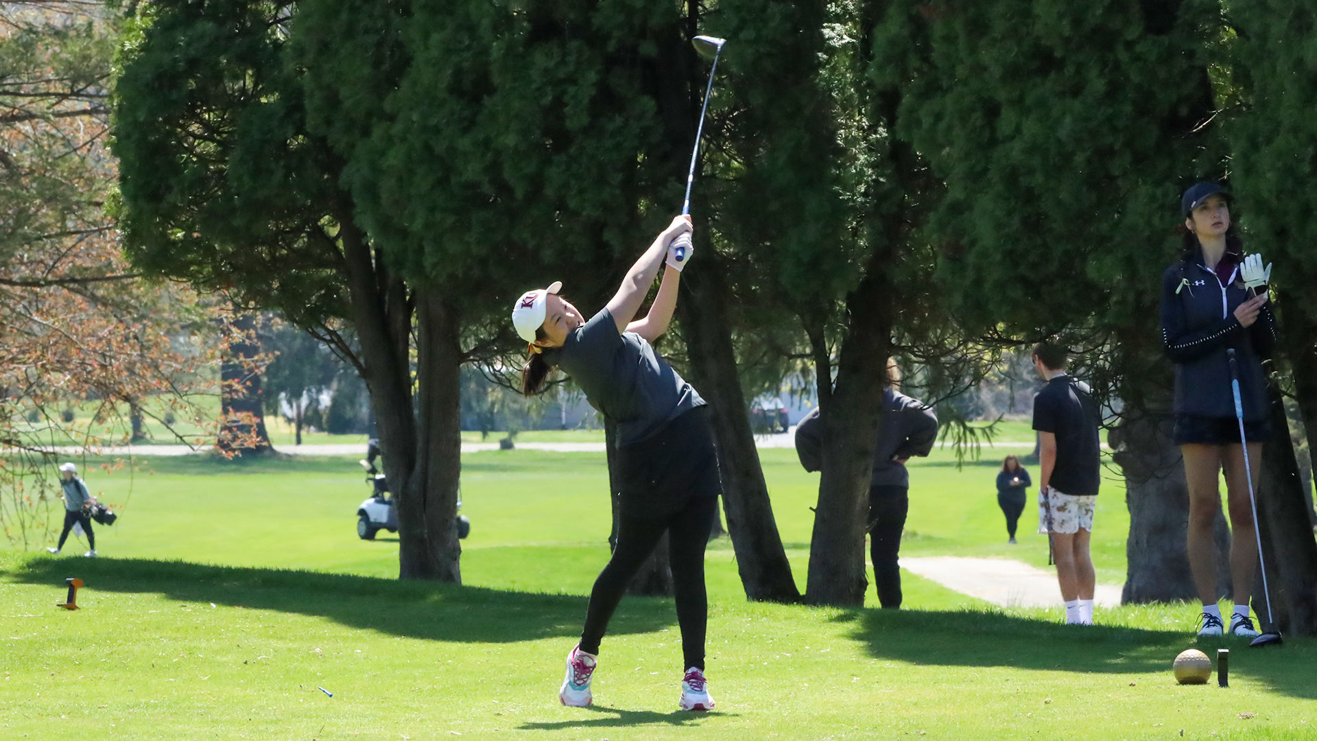 Livia Andov of the Kutztown University women's golf team hits a drive during the Husky Spring Invitational hosted by Bloomsburg on Thursday, April 9, 2026.