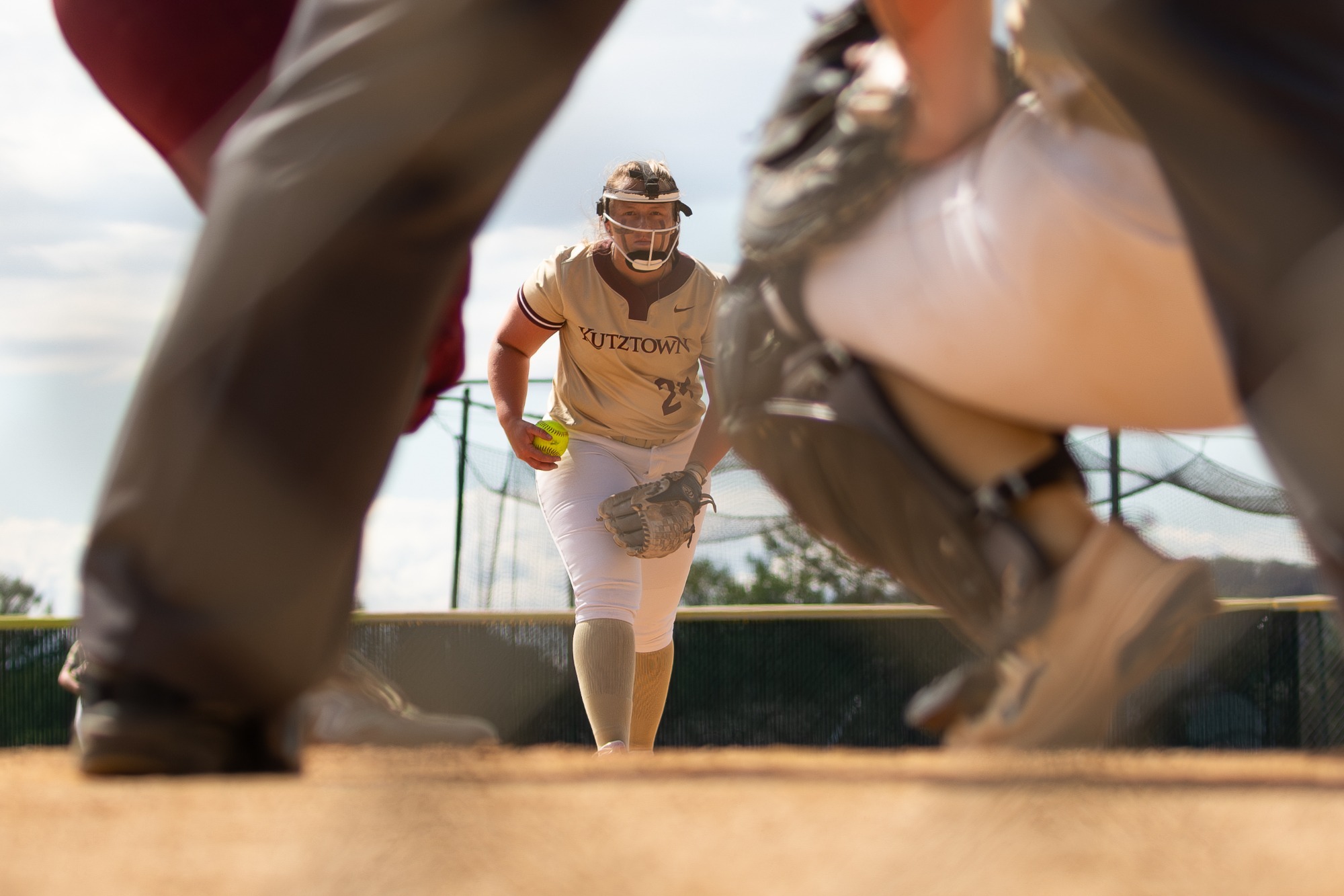 Haley Gravish getting ready to throw a pitch vs. Lock Haven, in the view behind the catcher, 4/18/26