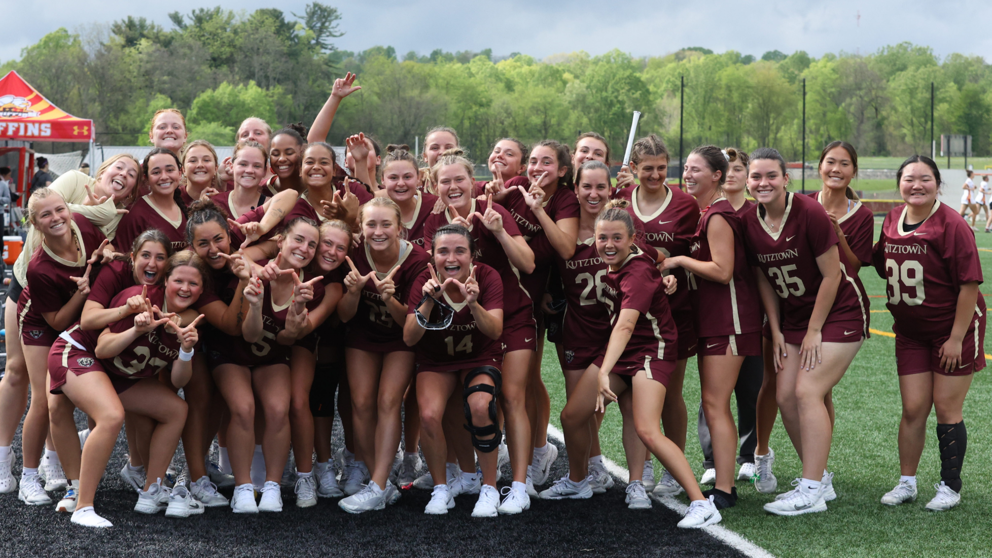 Kutztown Women's Lacrosse Team poses after PSAC Quarterfinal Win over Seton Hill