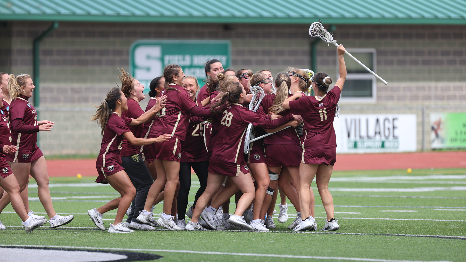 The Kutztown University women's lacrosse team celebrates after knocking off No. 4 Slippery Rock, 9-6, in the second round of the NCAA Division II Championship at Mihalik-Thompson Stadium on Saturday, May 9, 2026.