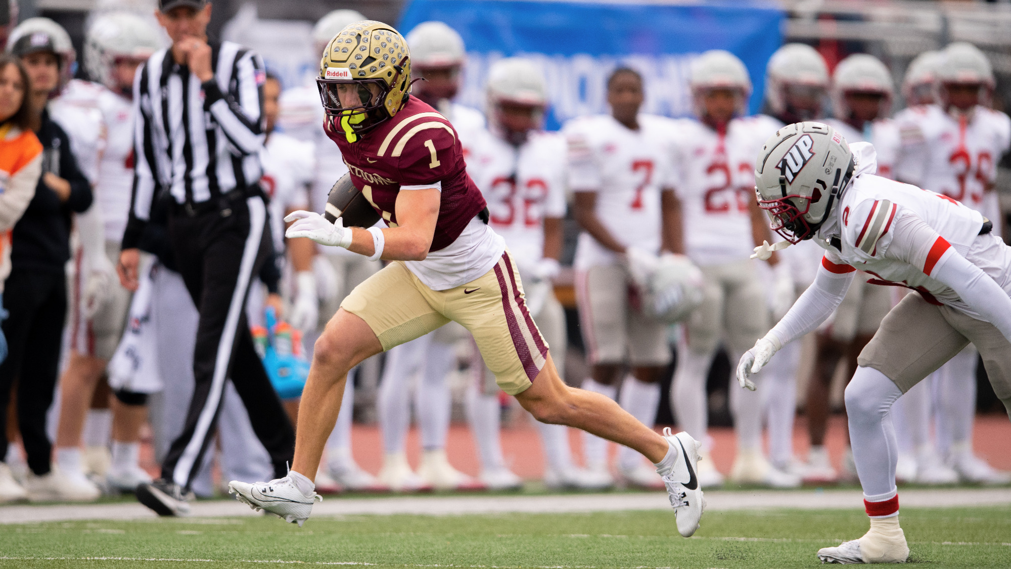 Wide receiver Noah Kracyla (1) of the Kutztown University football team outraces an IUP defender during the PSAC Championship game on Saturday, Nov. 15, 2025.