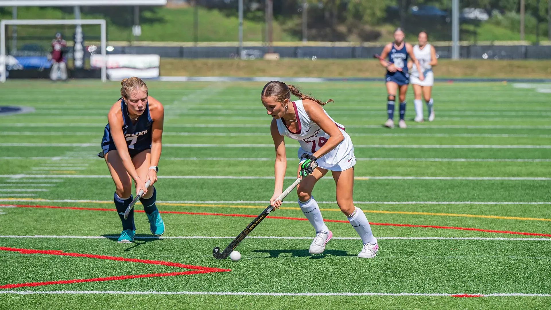 Mia Beneducci dribbling the ball at Saint Anselm, 9/12/26