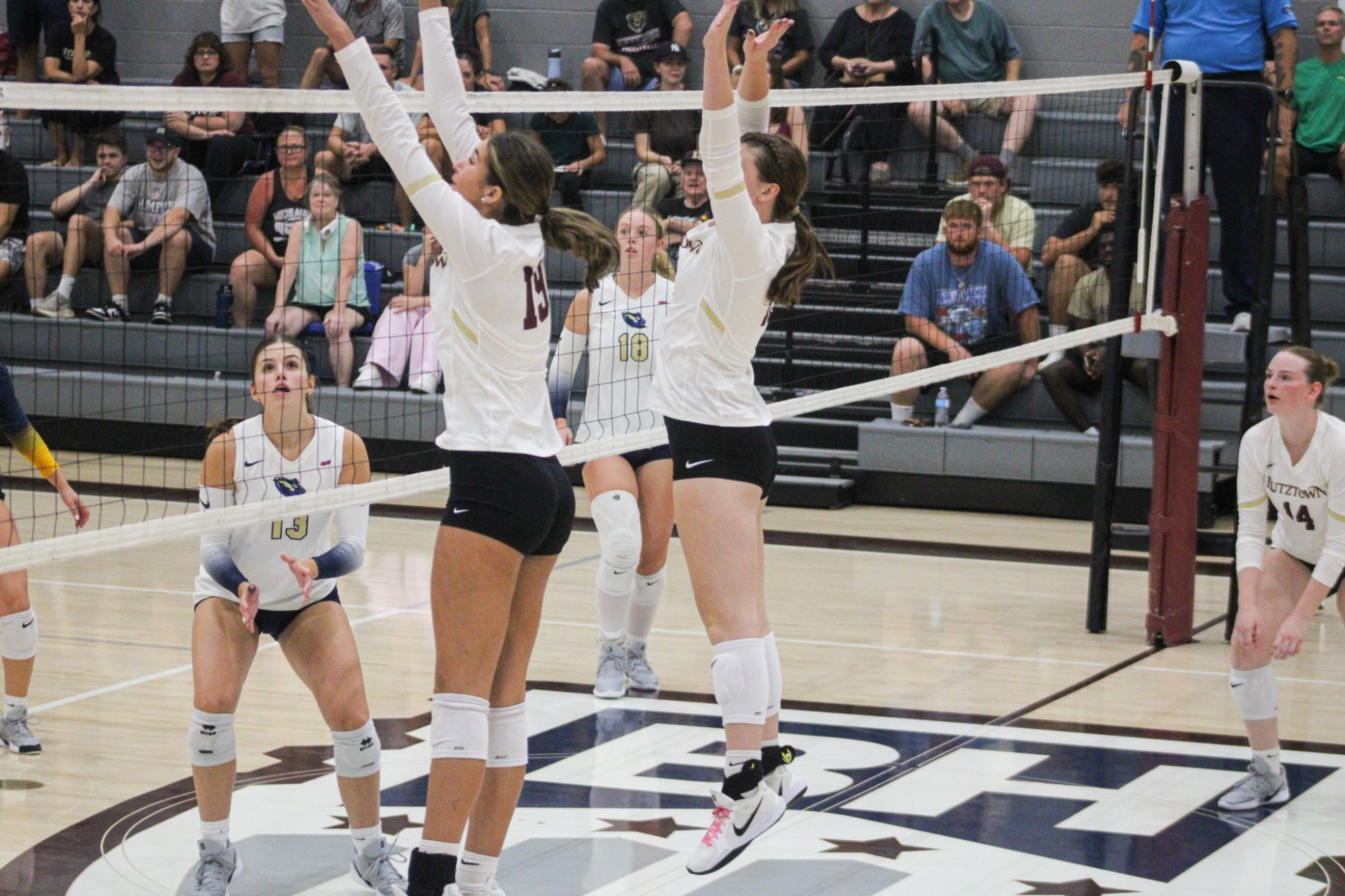 Molly Wentz and Emily Leppert attacking at the net vs. Goldey-Beacom, 9/1/26