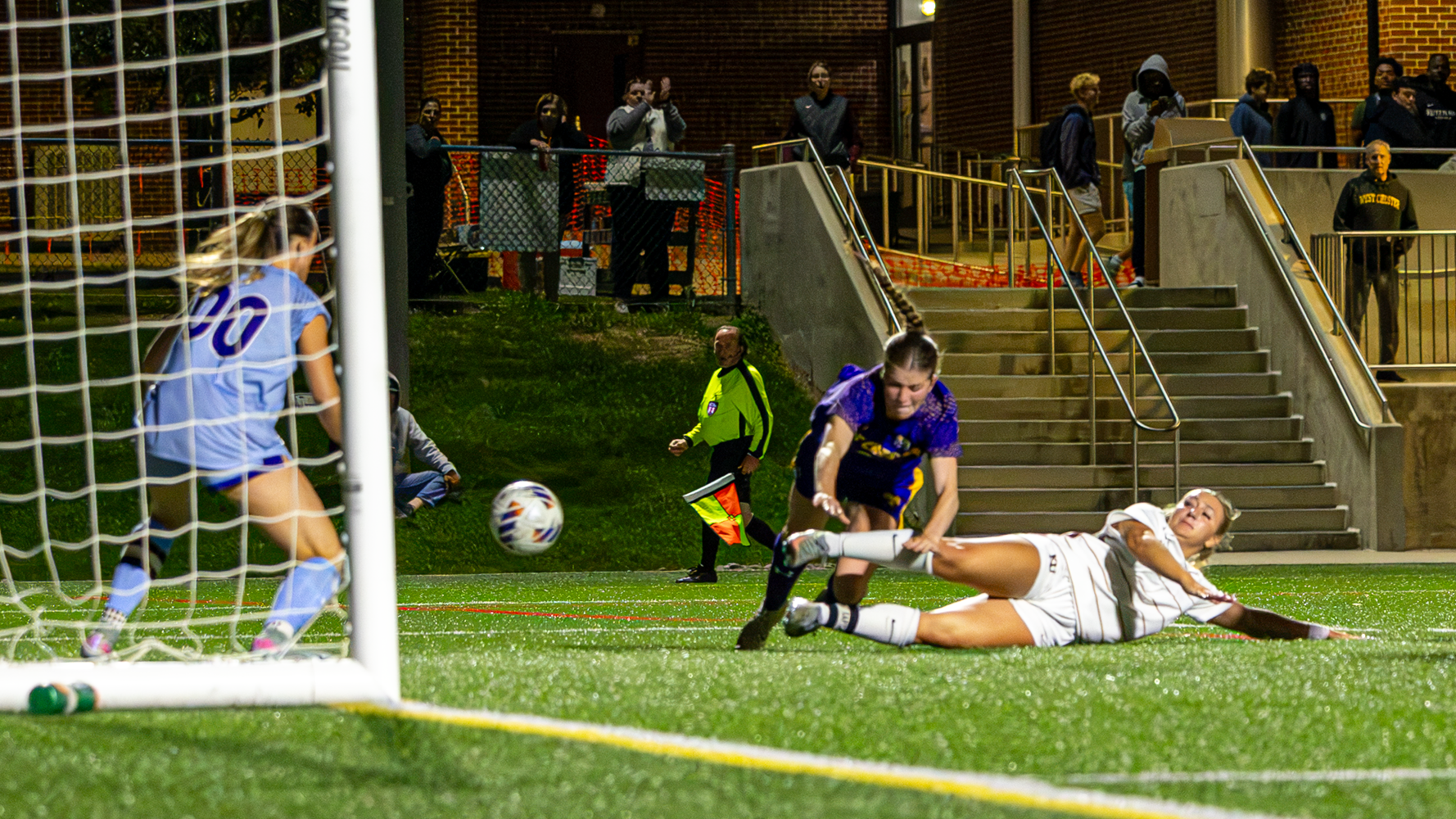 Corinne Morgan taking a shot in front of goal vs. West Chester, 9/23/26