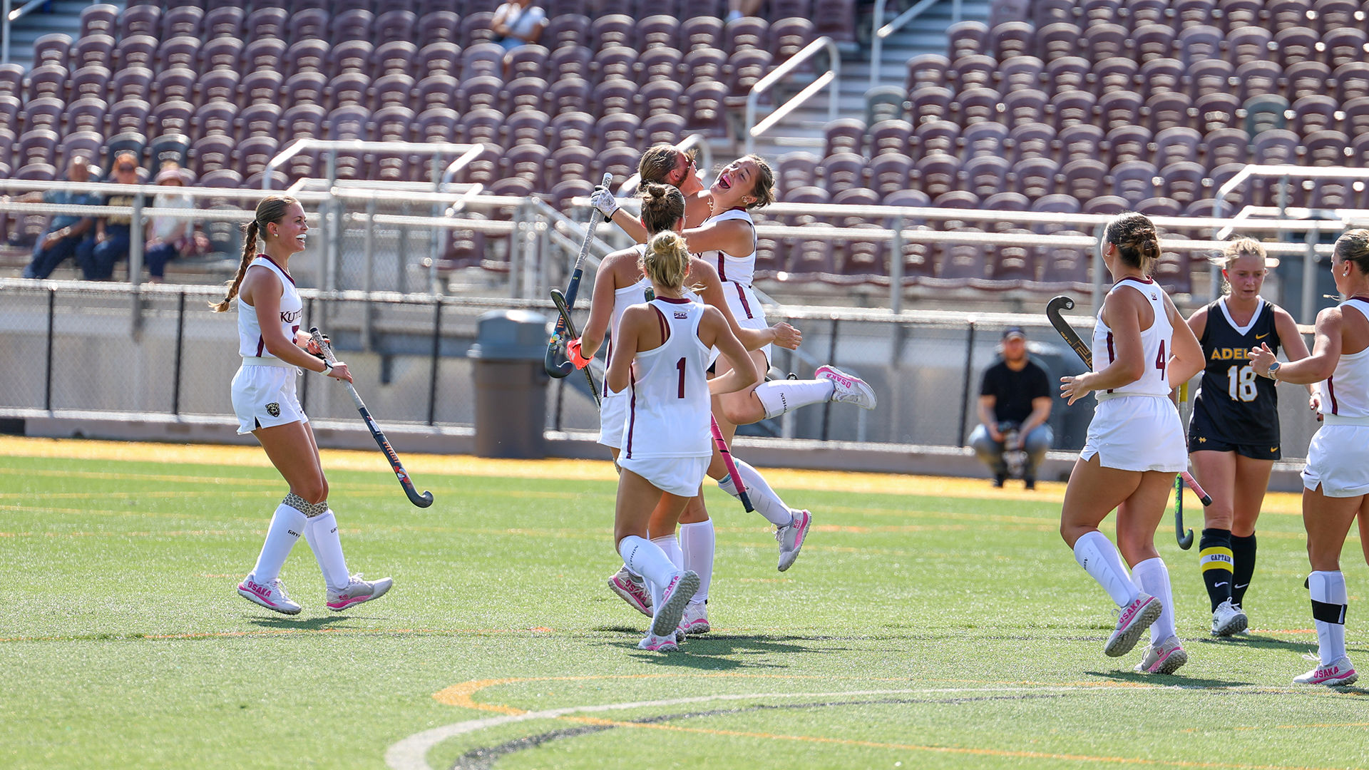Rachel Galasso of the Kutztown University field hockey team jumps into the arms of teammates after scoring a first quarter goal at Adelphi on Thursday, Sept. 3, 2026.