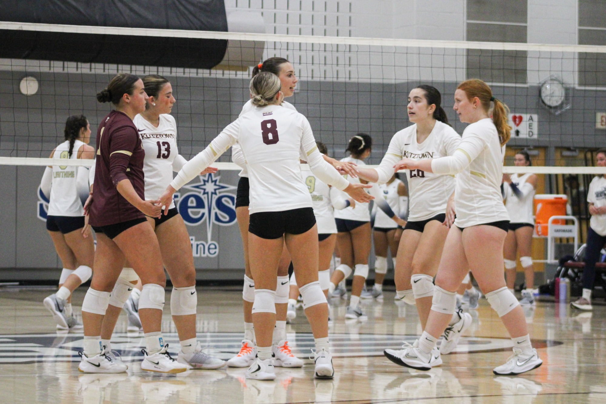 Kutztown women's volleyball celebrating vs. Goldey-Beacom, 9/1/26