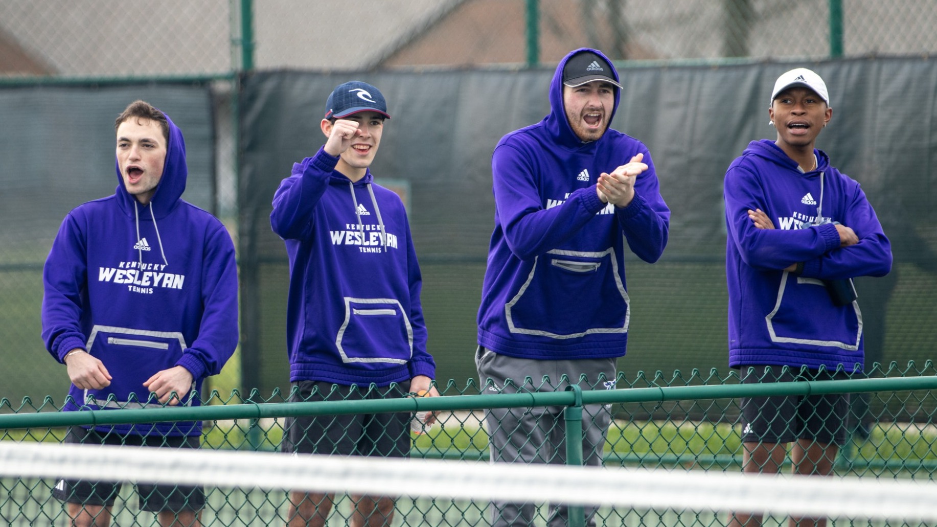 Tennis boys celebrating
