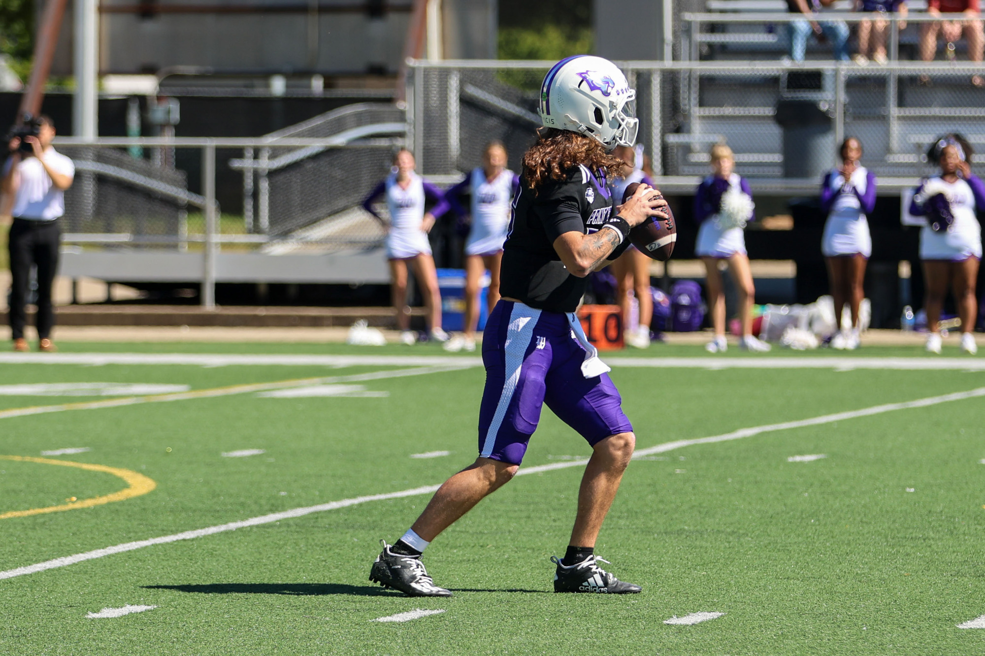 quarterback Tyler Thompson (16) attends an event