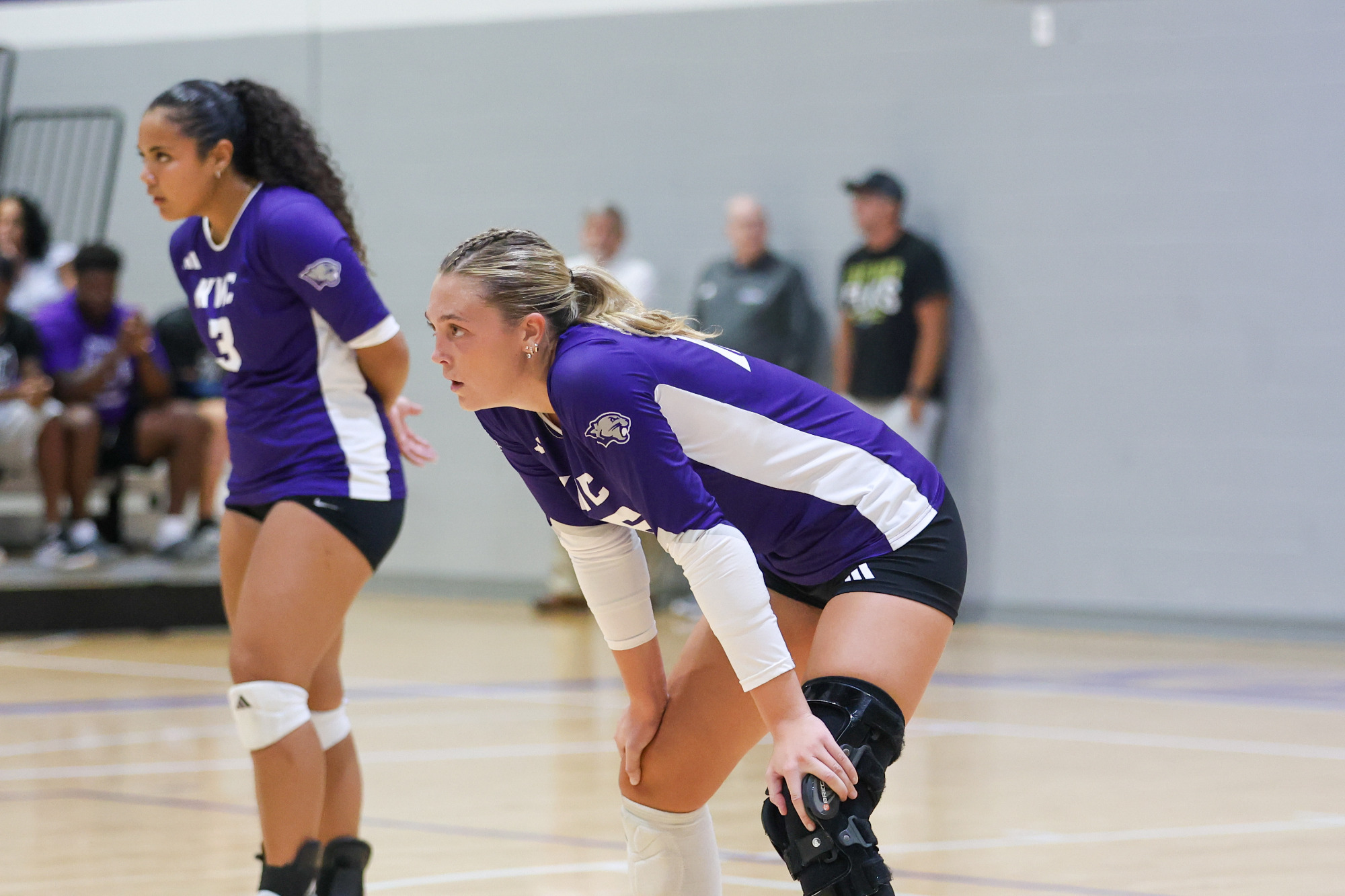 volleyball player hands on knees