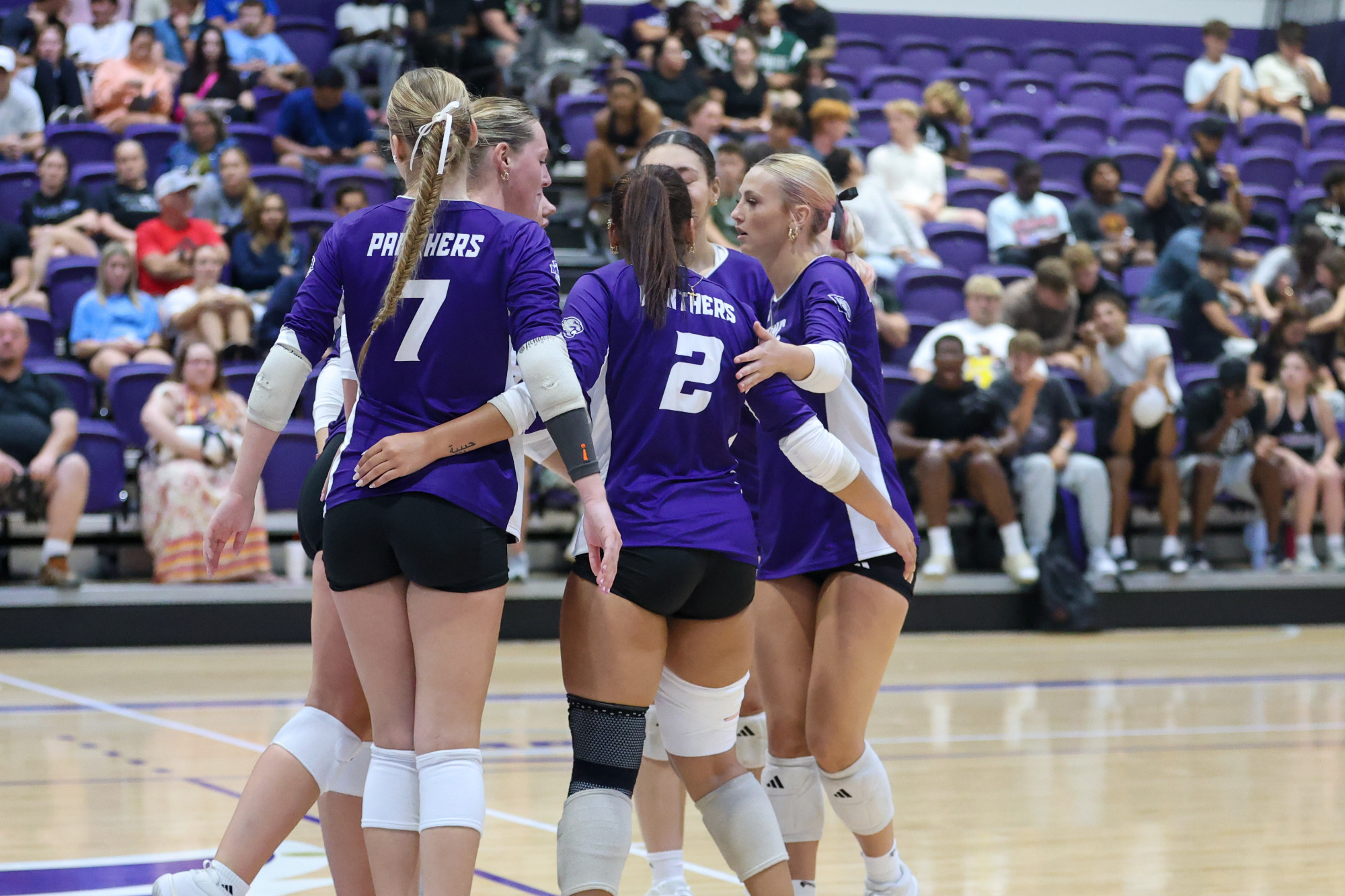 outside hitter Ava McNair #19 and outside hitter Kami Parlin #4 attend an event