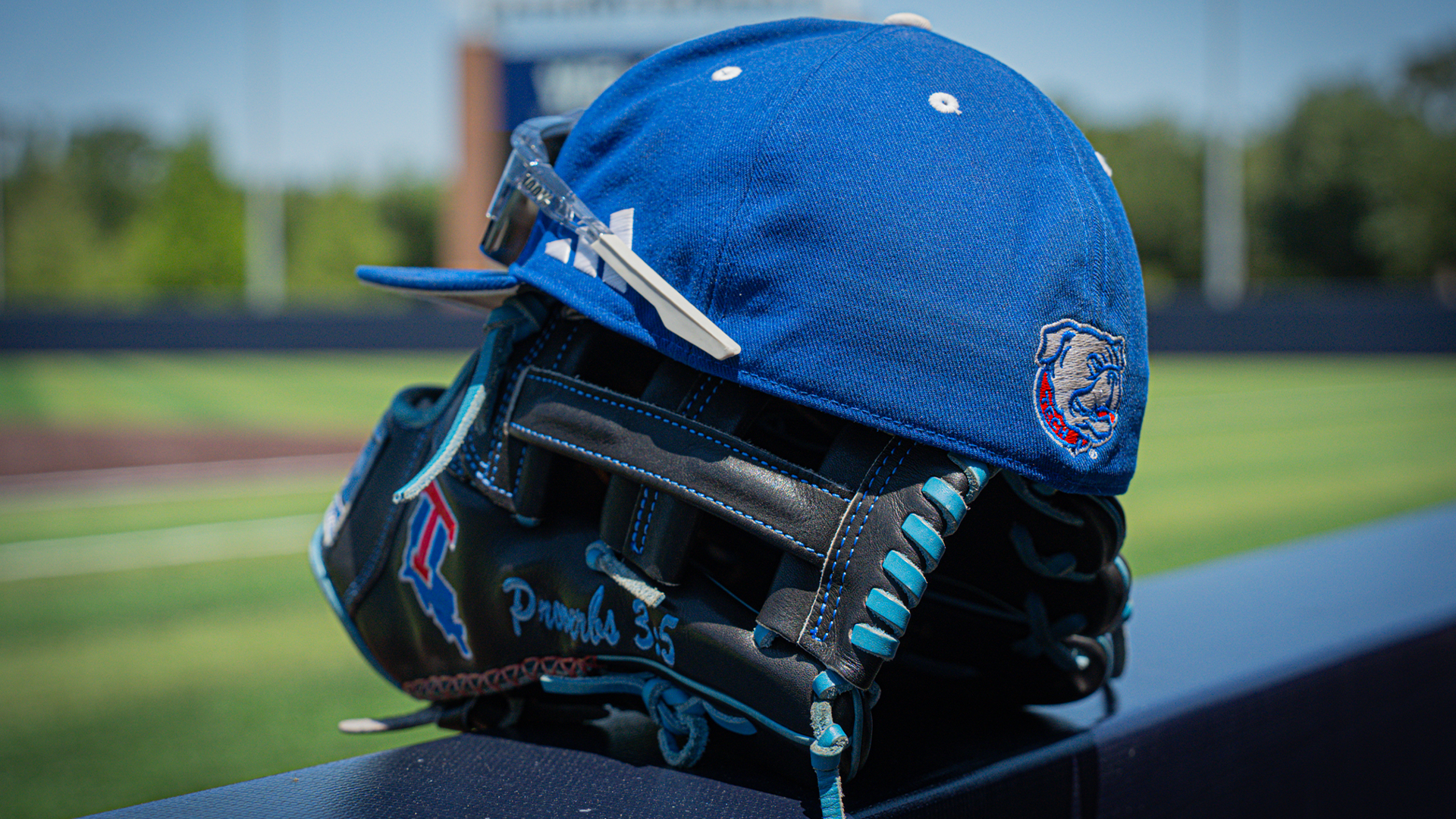 LA Tech baseball hat and glove