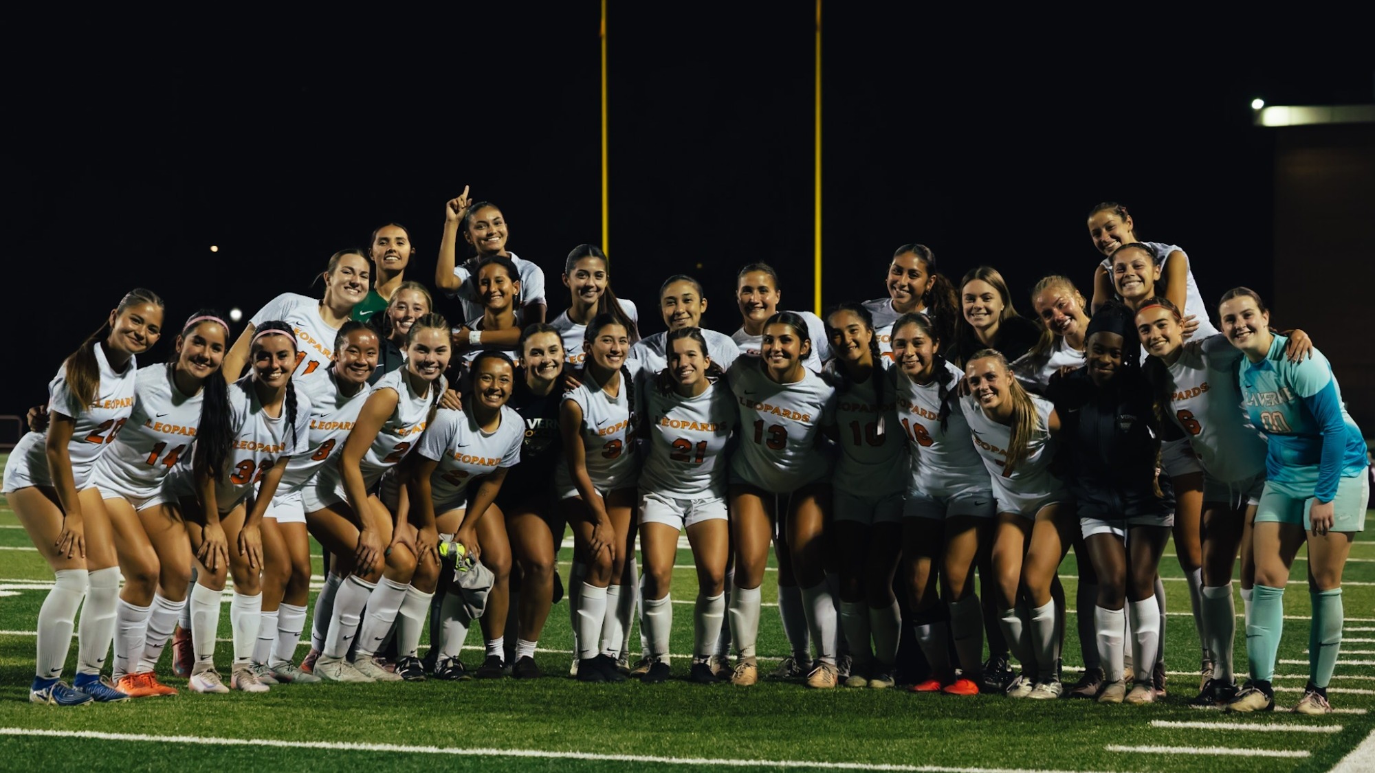 Whole Team Poses and Smiles 