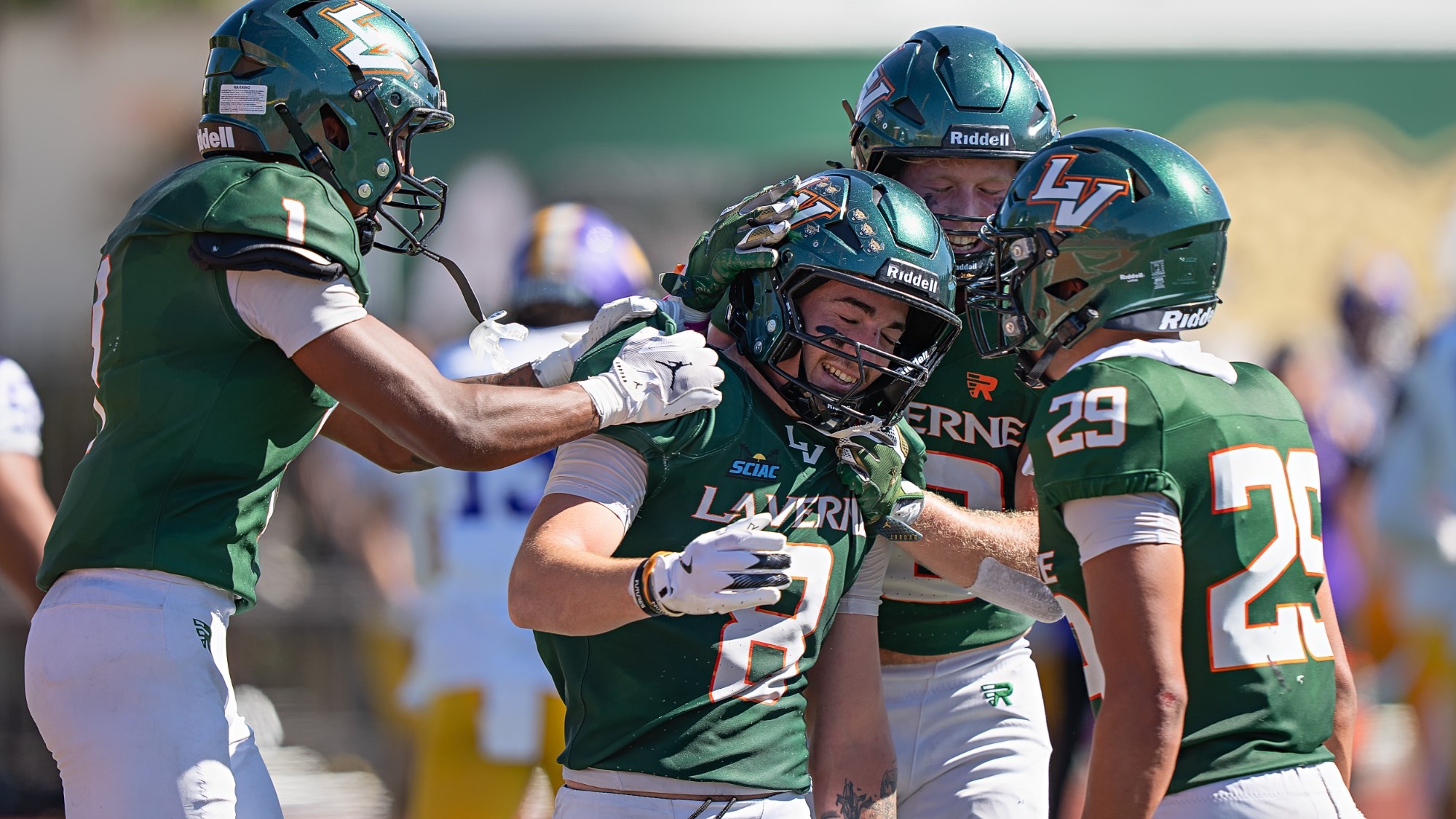 The Leopards defense celebrates with Justin Mondidni
