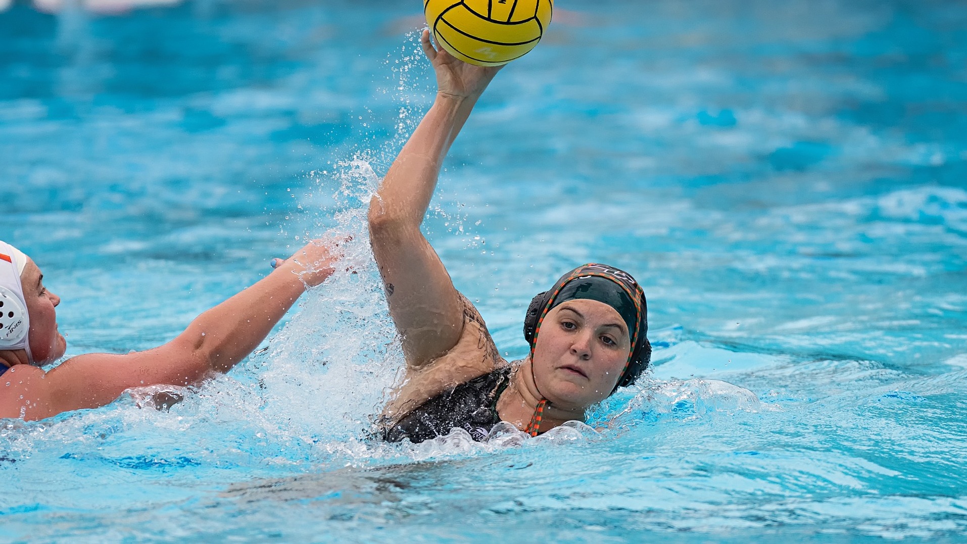 Maddie Grove moves past a Pomona-Pitzer defender