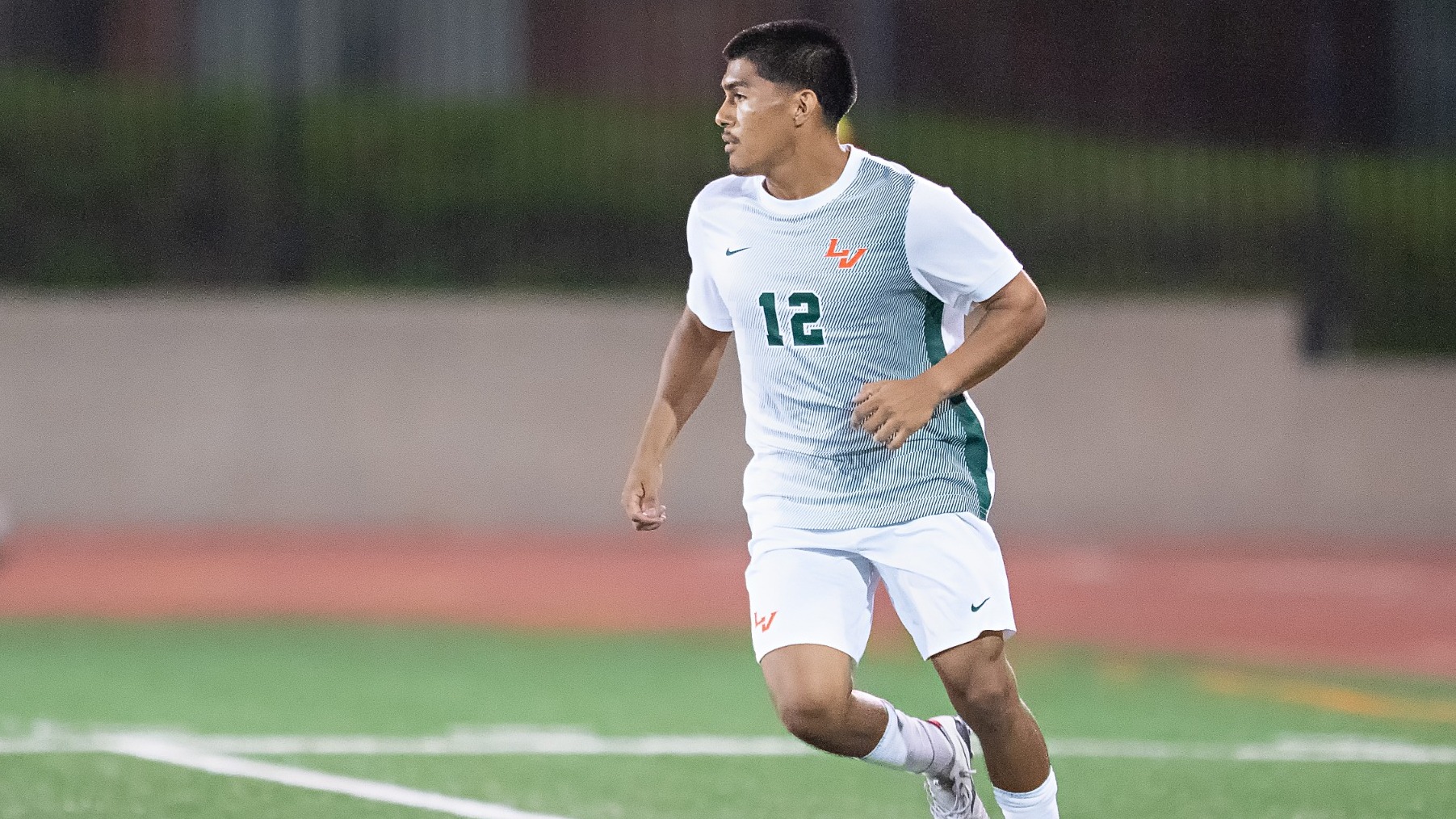 Julian Arellano scans the field against George Fox