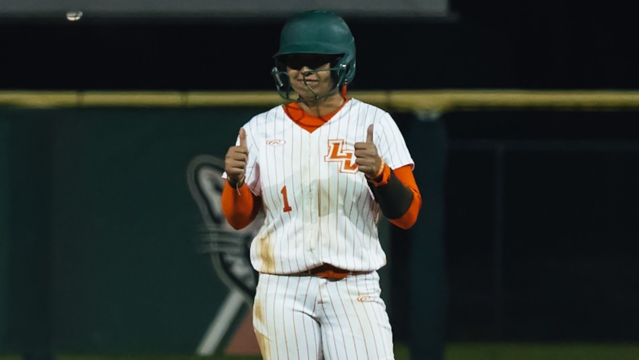 Julia Miramontes celebrates at second base against Trinity