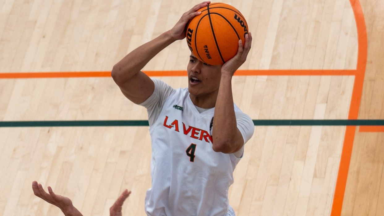 Cody Aquino lays in a shot against Chapman