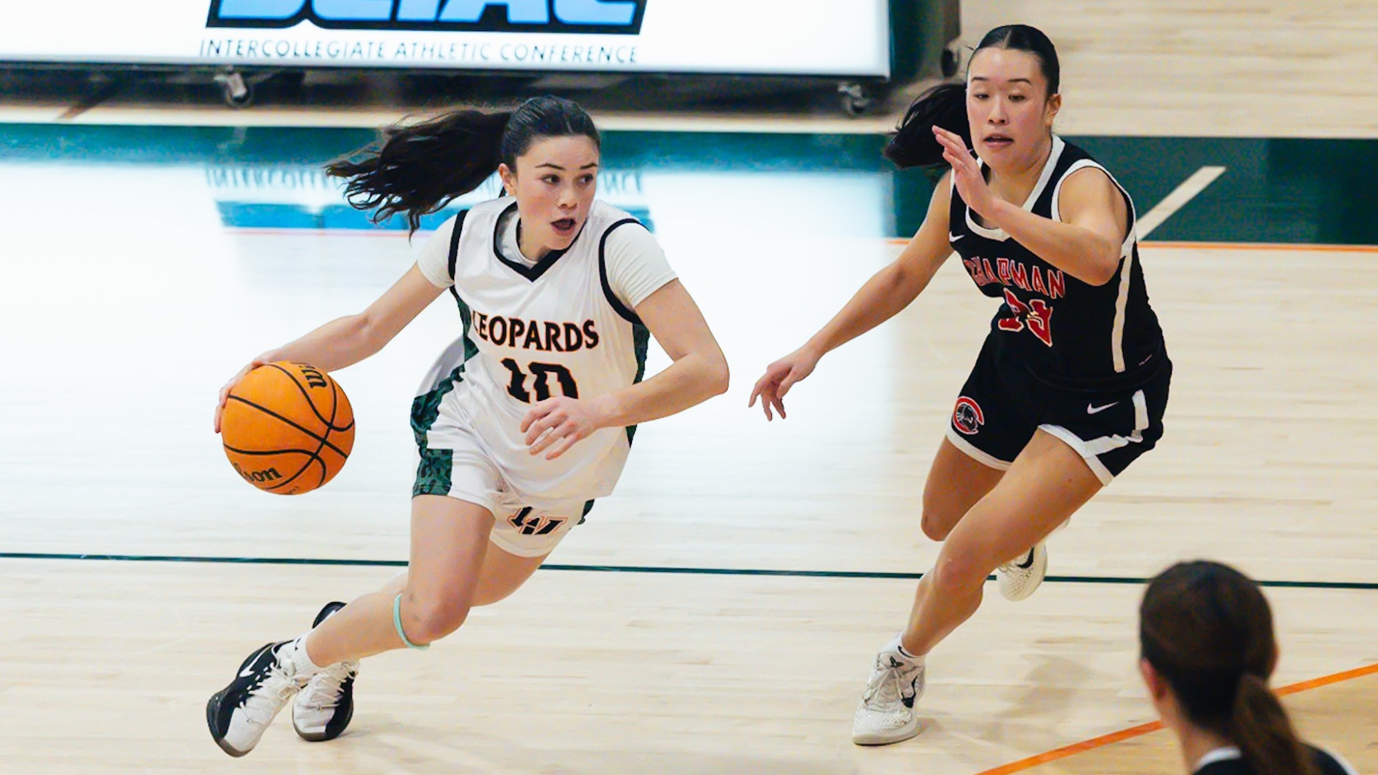 Gray-Musolff Dribbles Past Defender