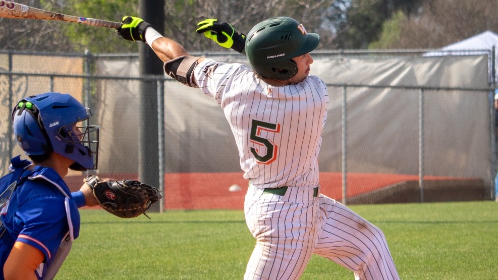 Nathan Perry gets a hit against Pomona-Pitzer