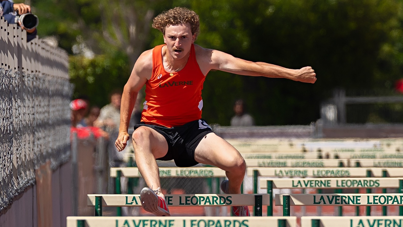 Hunter Bond competes in the 110m hurdles at the Leopard Invitational