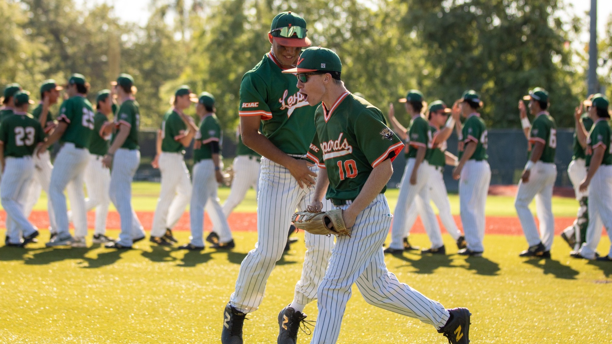 Jake Ledford and Tommy Villanueva celebrate after defeating Chapman in the 2026 SCIAC Tournament Opener