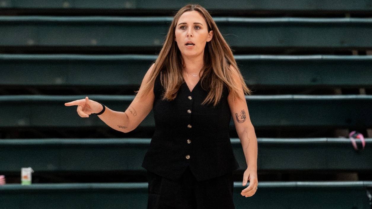 Randi Taylor-Toomay coaches against Whitworth