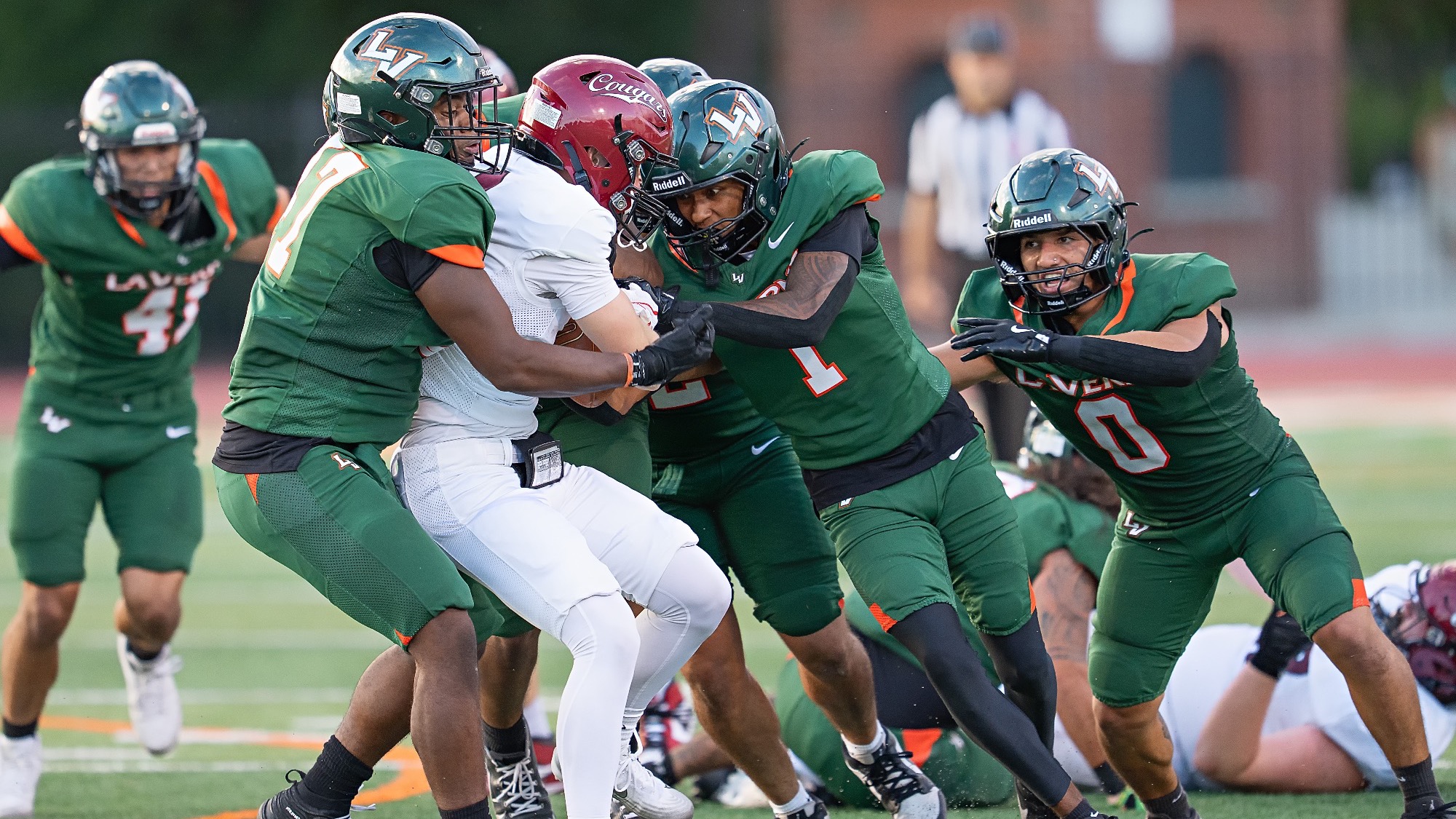 Micah Espana, Jomar Brown, Chase Yanez Football Action Shot 9/5/26