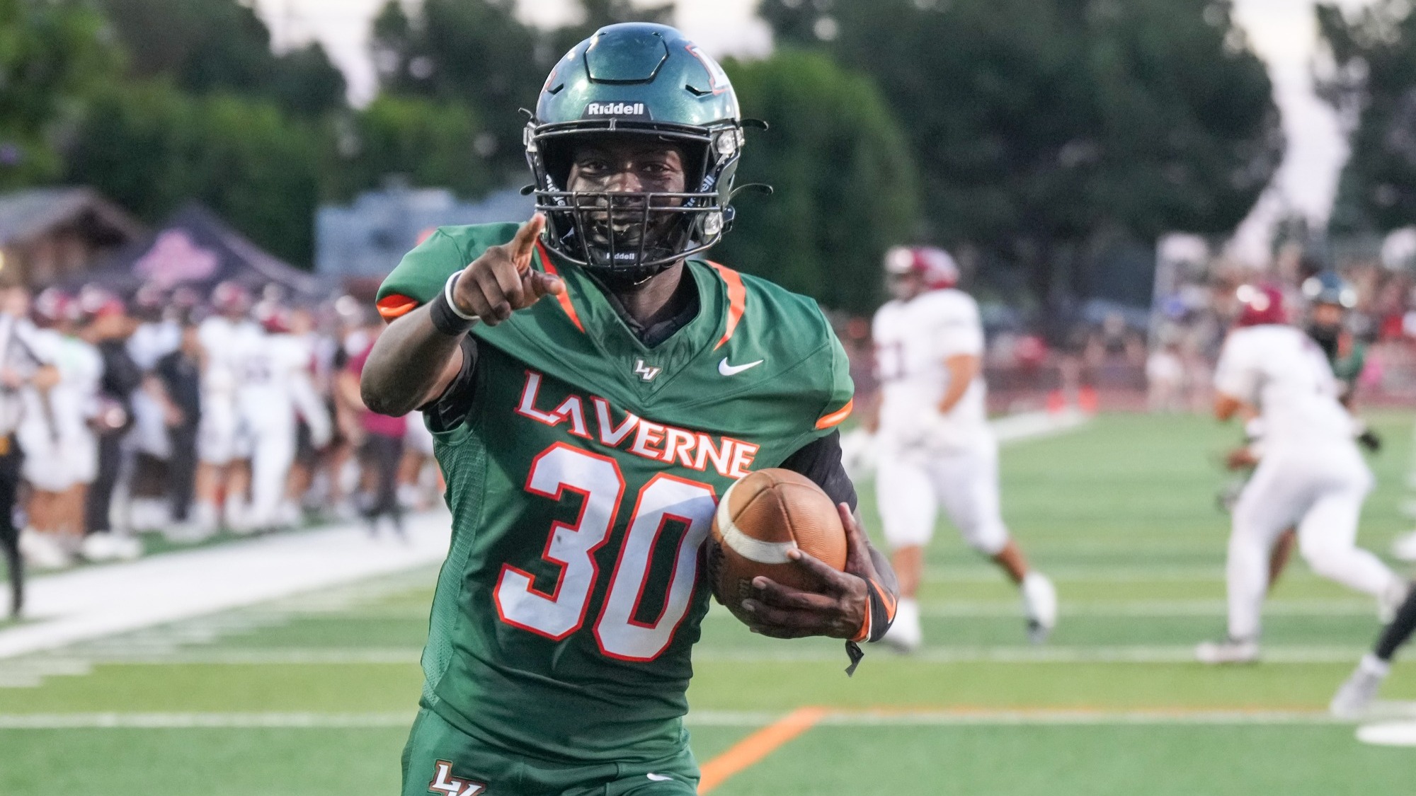 Trevon Kenney celebrates after his pick-six against APU.