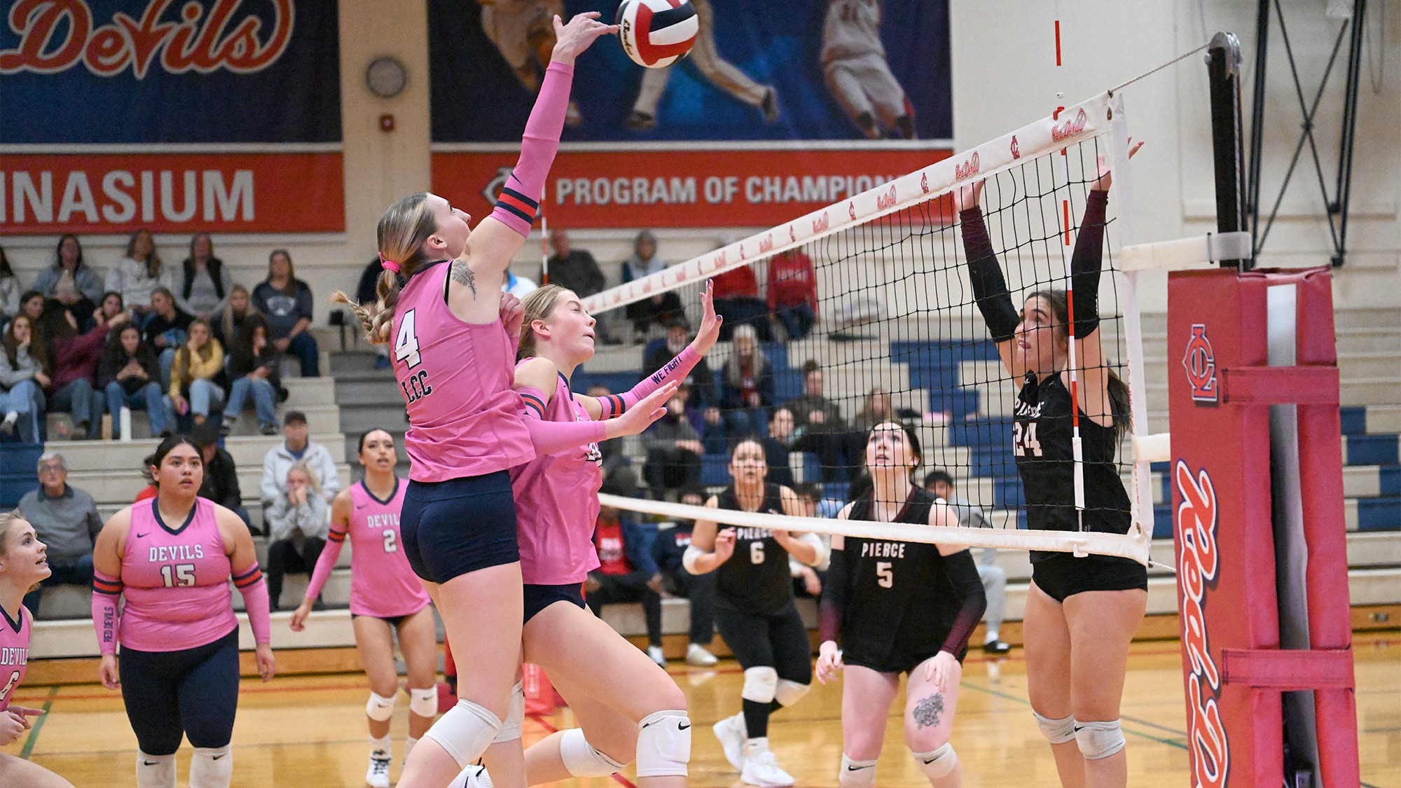 Karissa Otterstetter goes over Claire Neuman for the kill