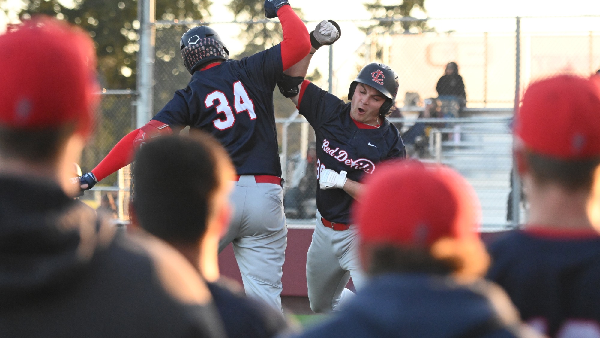 Harlan Rowe celebrates his home run vs Pierce
