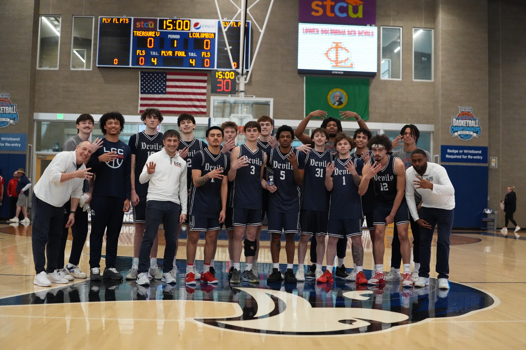 Devils team photo with Final Four Trophy