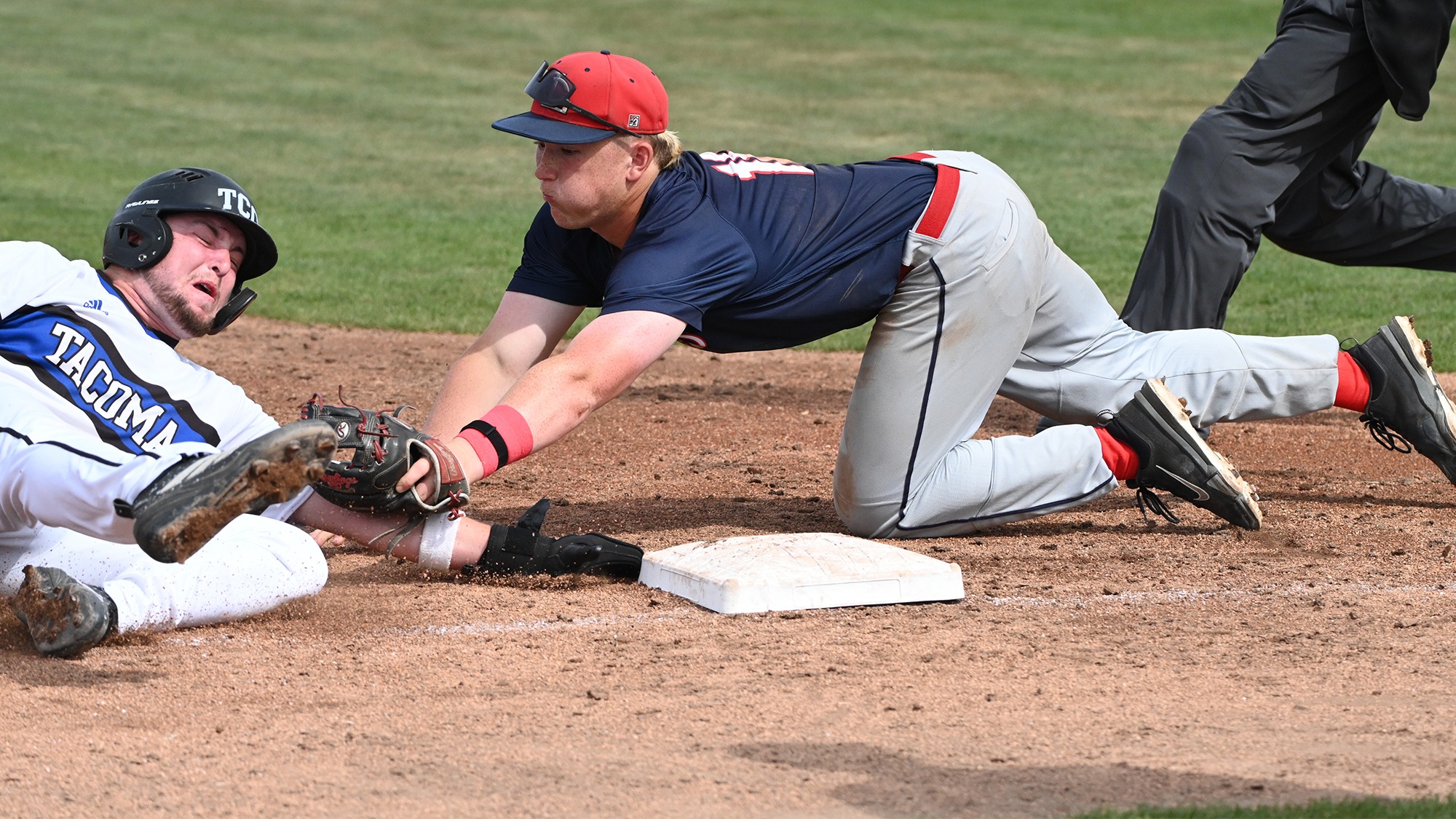 Sam Davidson makes the tag at third vs Tacoma