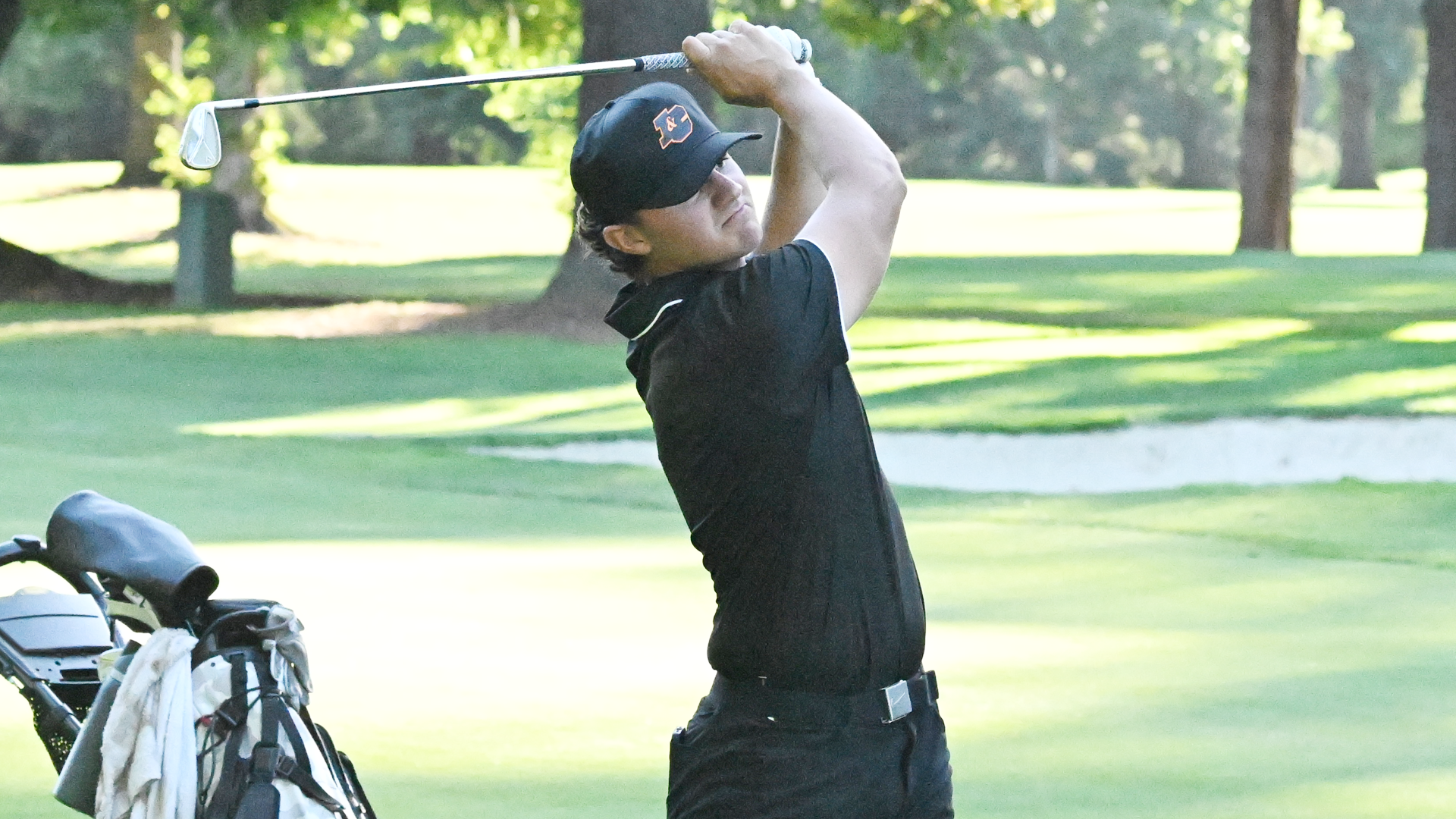 Mason Hill hits an iron shot