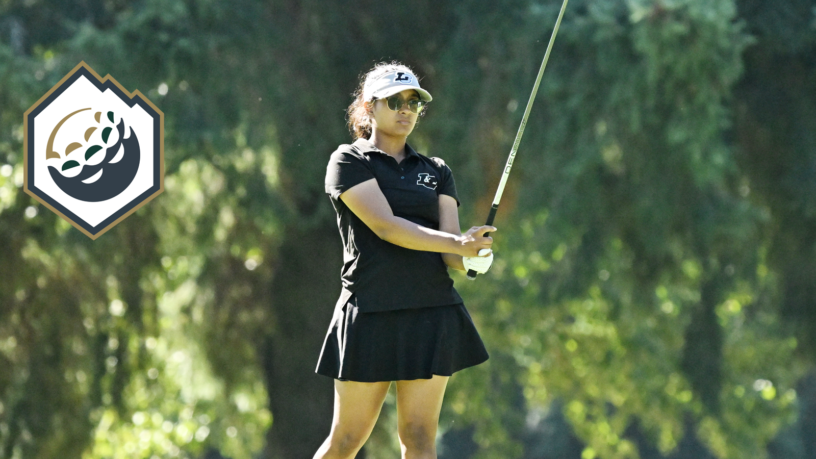 Ahika Jani watches her driver shot fly down the fairway