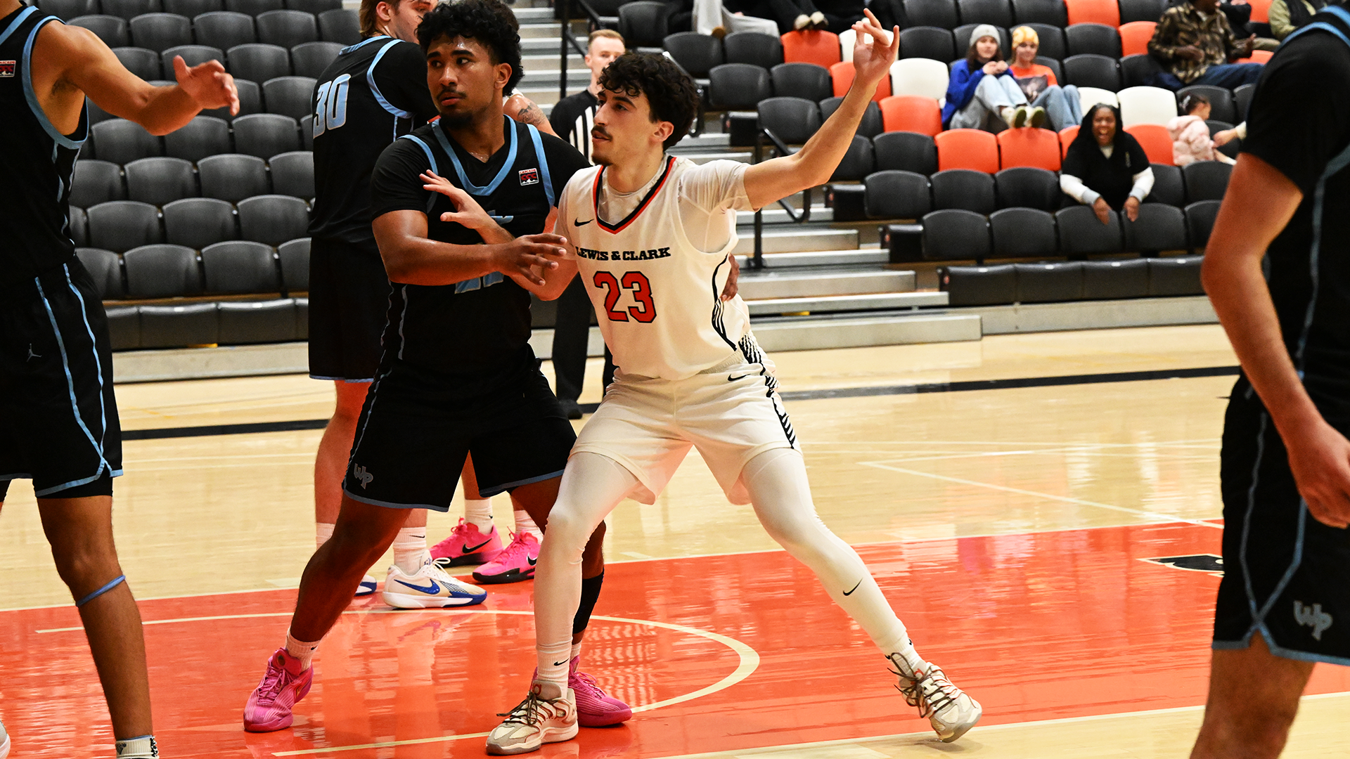 Yigit Arcan fights for position on an inbound play. 
