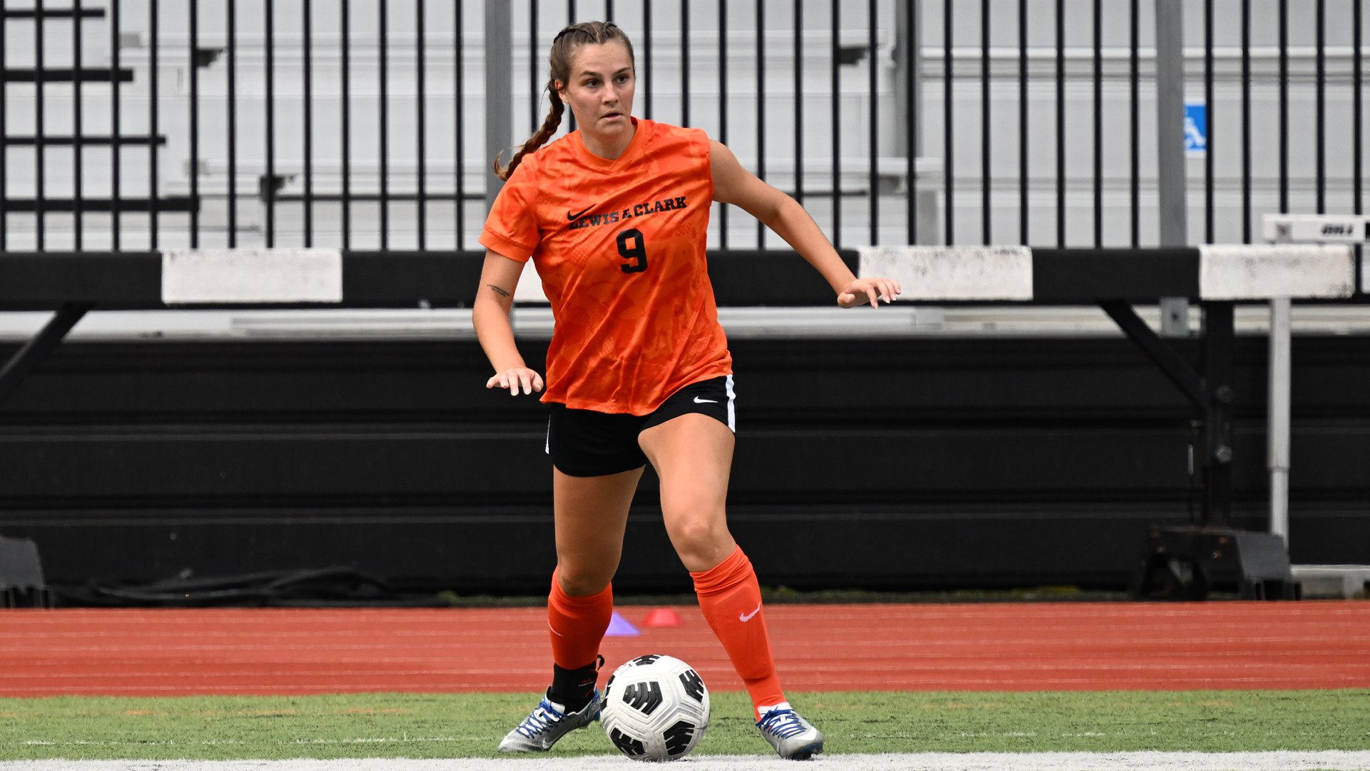 Siena Flock looks up field for someone to pass too 