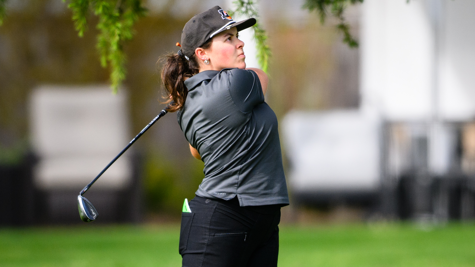 Evie Denton watches her iron shot fly towards the hole