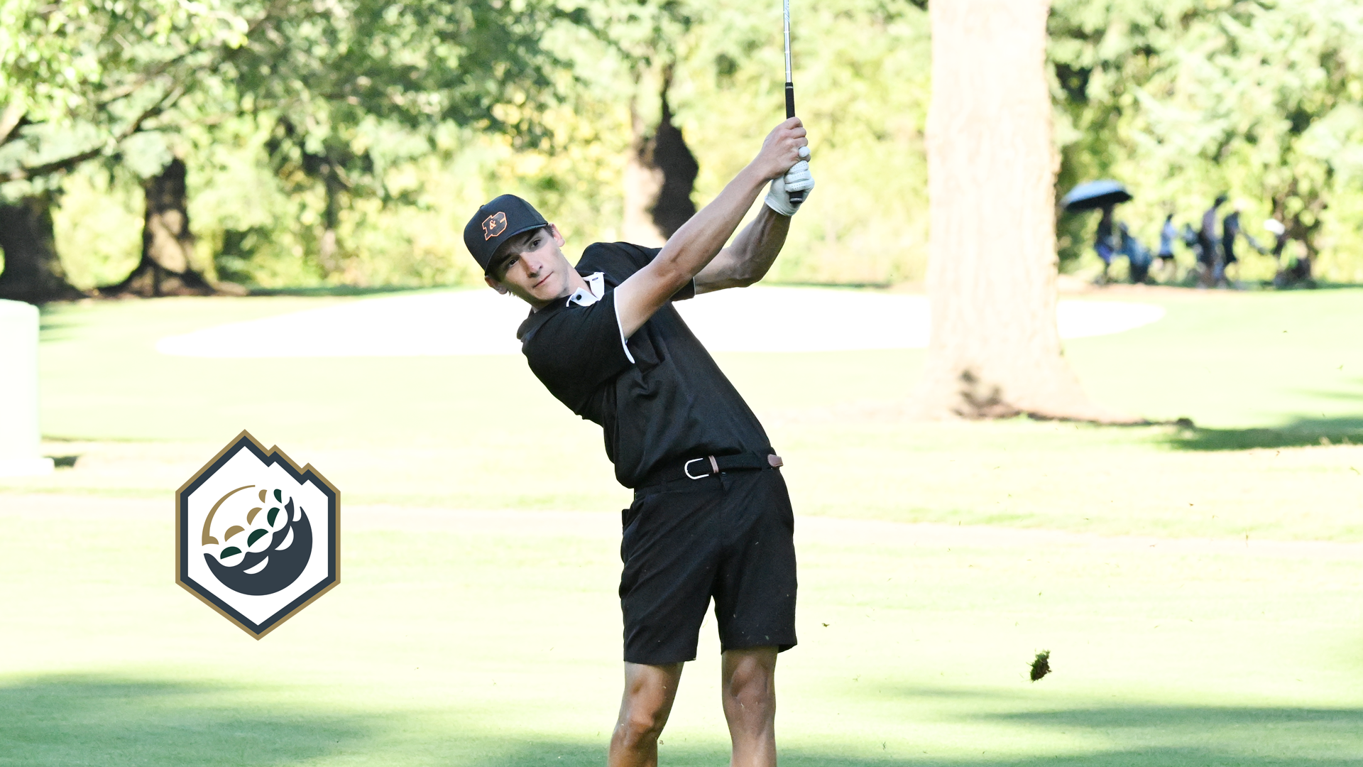 Charlie Hageman watches his iron shot fly towards the green