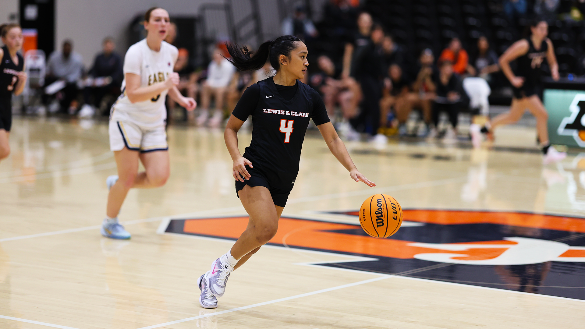 Tatiana Rebanal dribbles the ball down the courth
