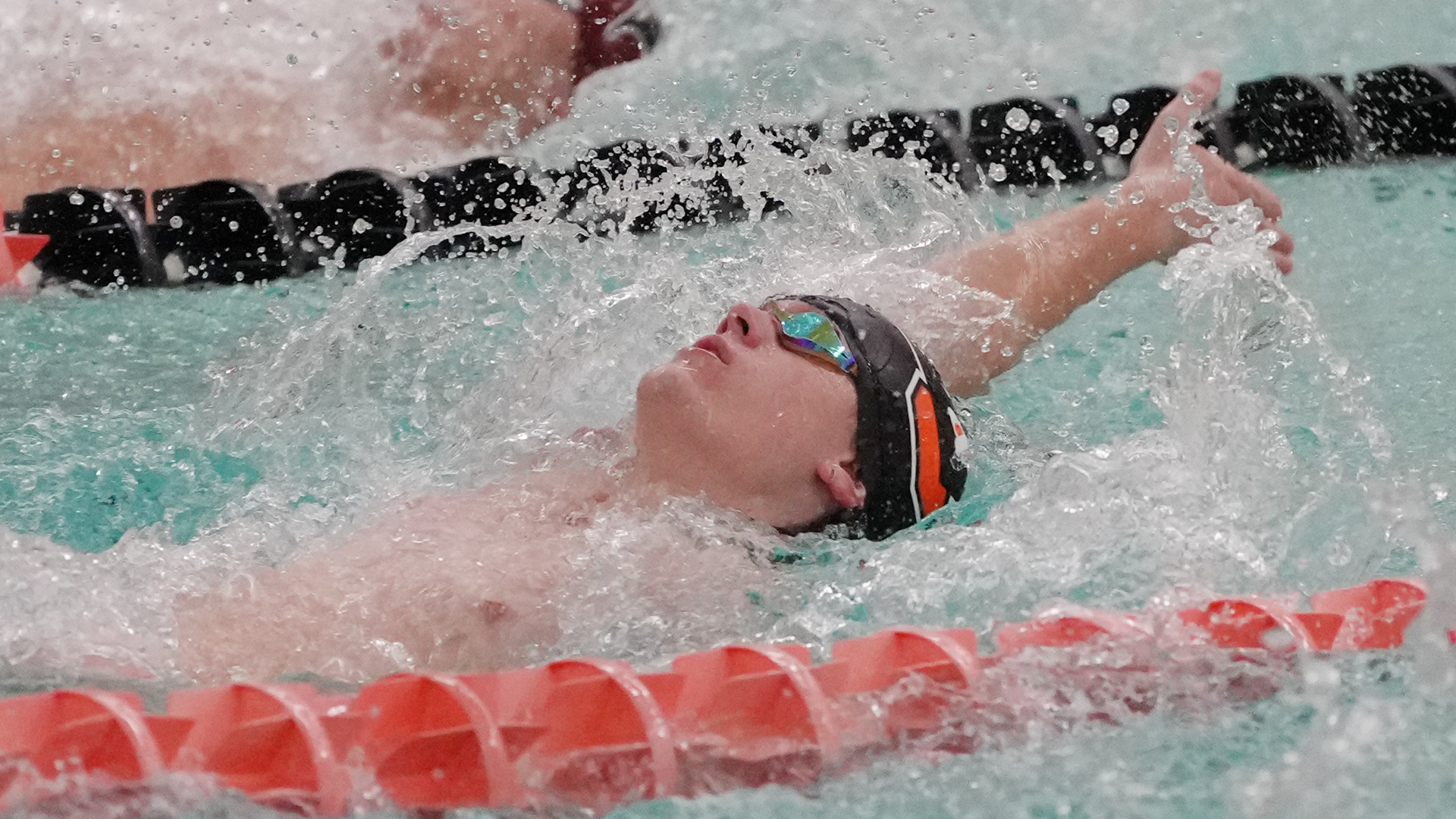 Isaiah Frei swims the backstroke
