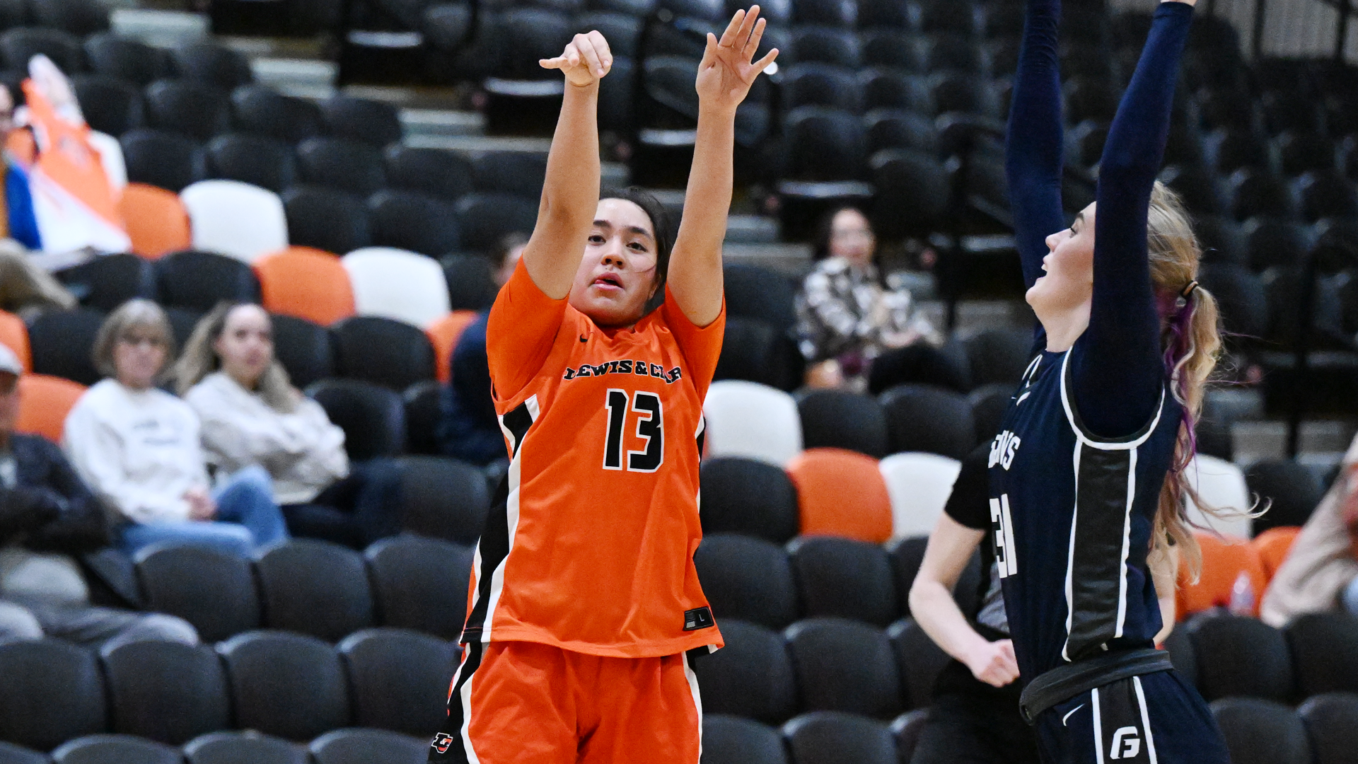 Lilly Jordan shoots the ball against a defender. 