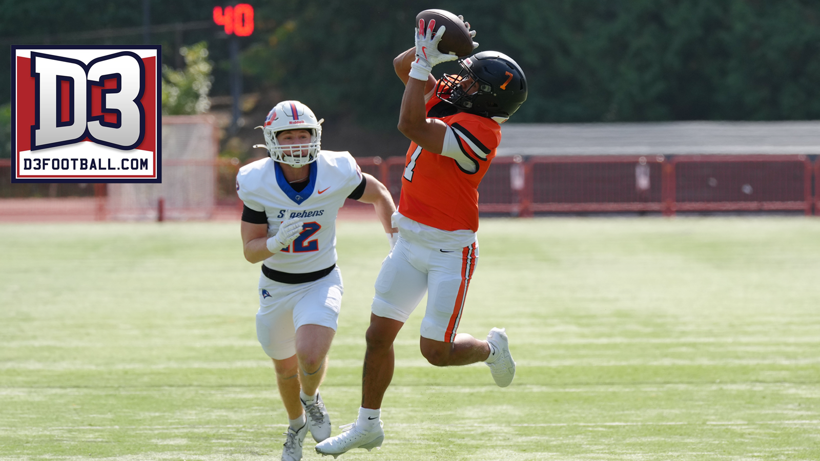Sytyn Lasconia jumps up to make a catch against Pomona-Pitzer