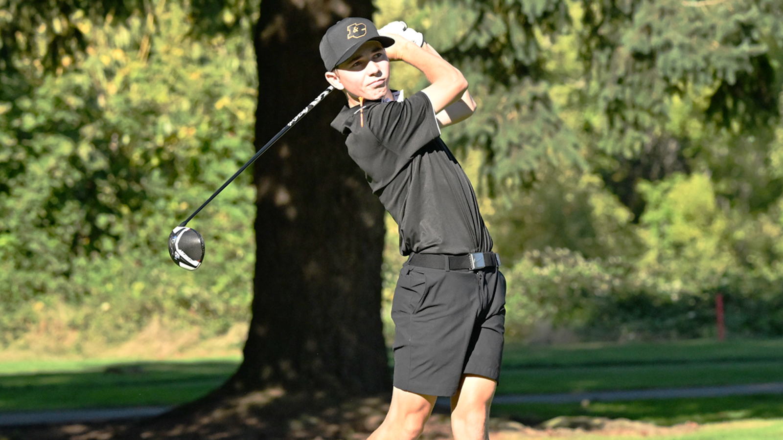 Brady Gless hits a driver shot and watches it fly