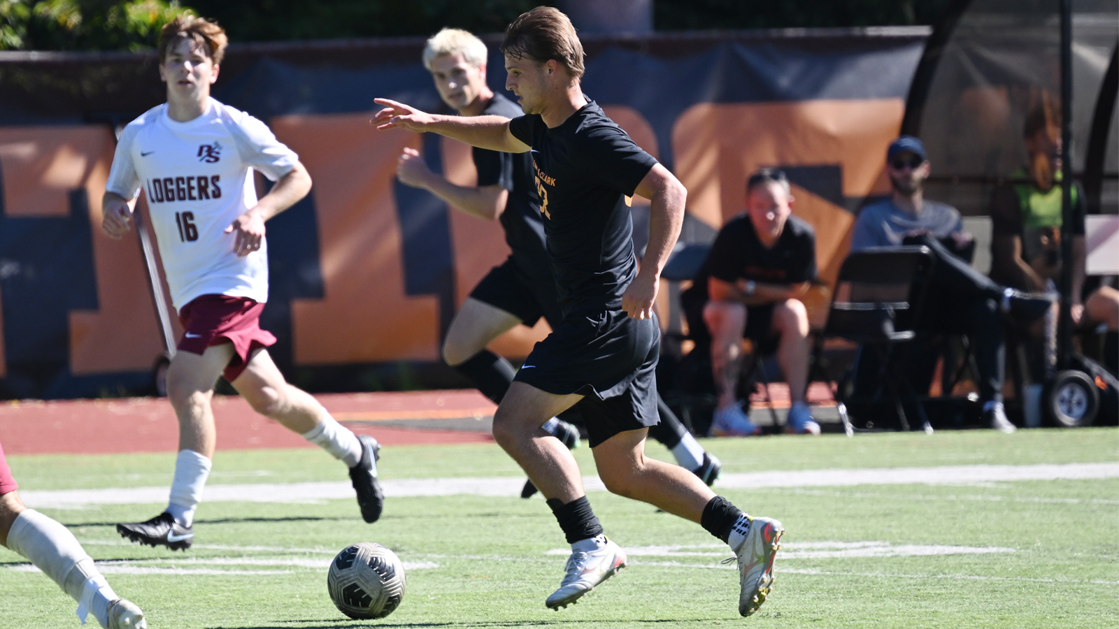 Raff Ladd dribbles the ball through the midfield against Puget Sound