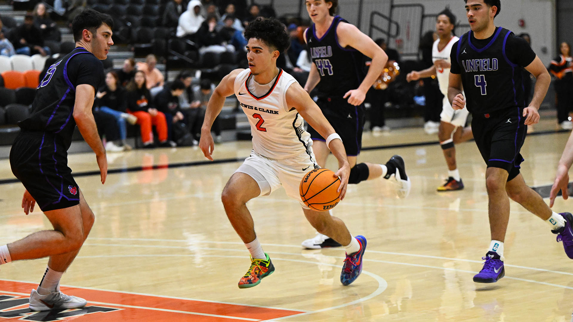 Taien Jackson dribbles against a defender