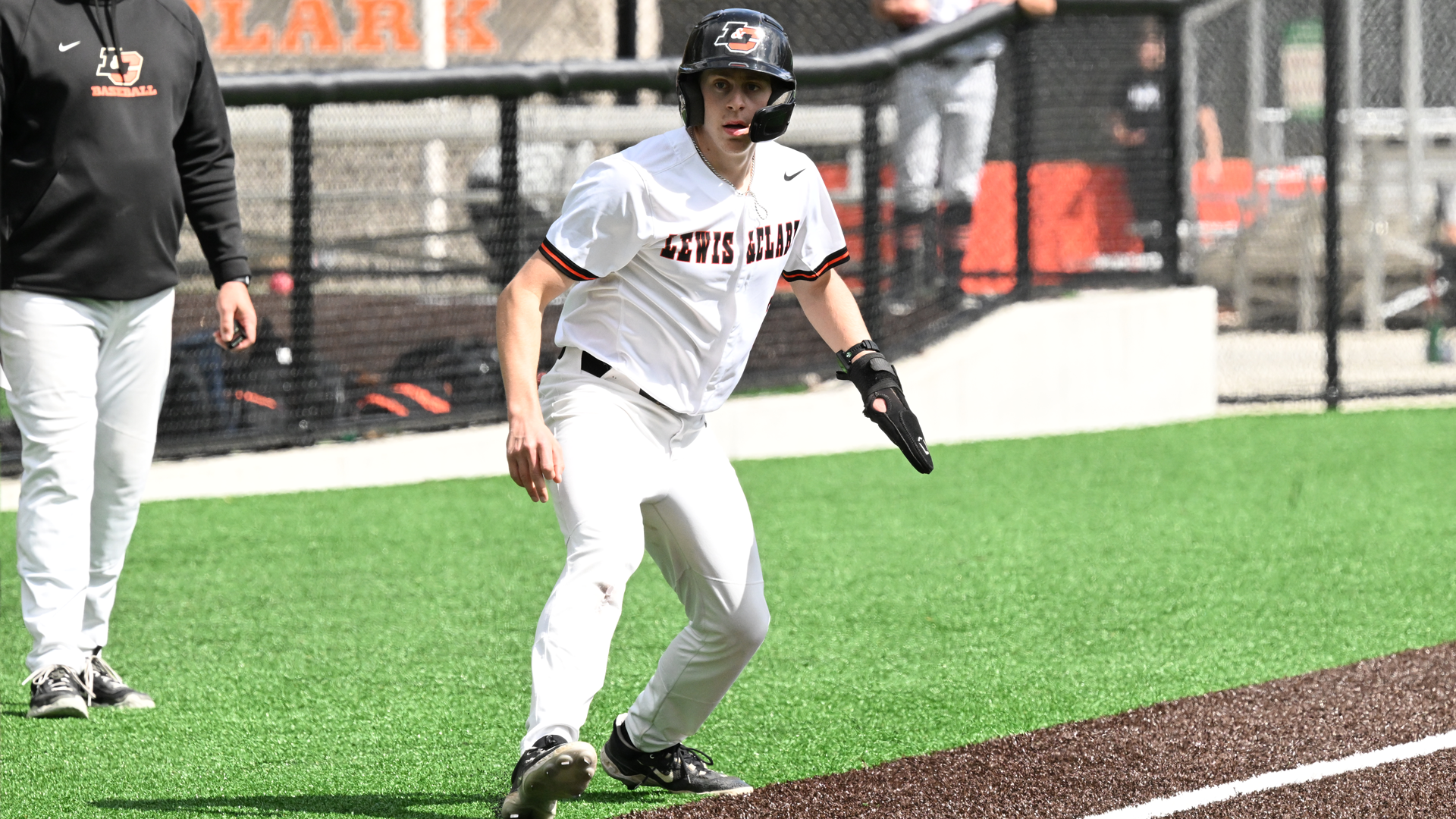Eli Steinhaus bounces off third base as he waits for the pitch